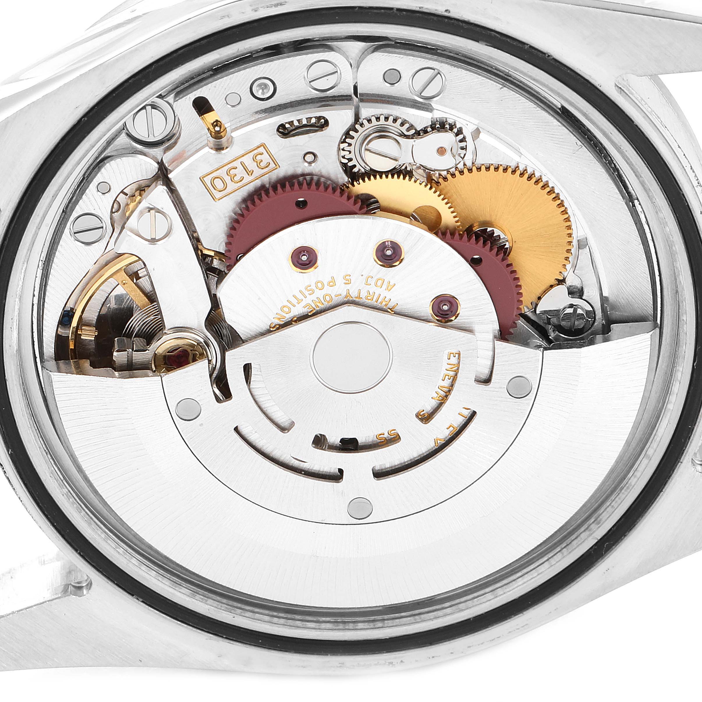 This image shows the inner mechanical movement of a Rolex Explorer 114270 Men's Stainless Steel Black Dial 114270 Men's Stainless Steel Black Dial watch with visible gears and components.