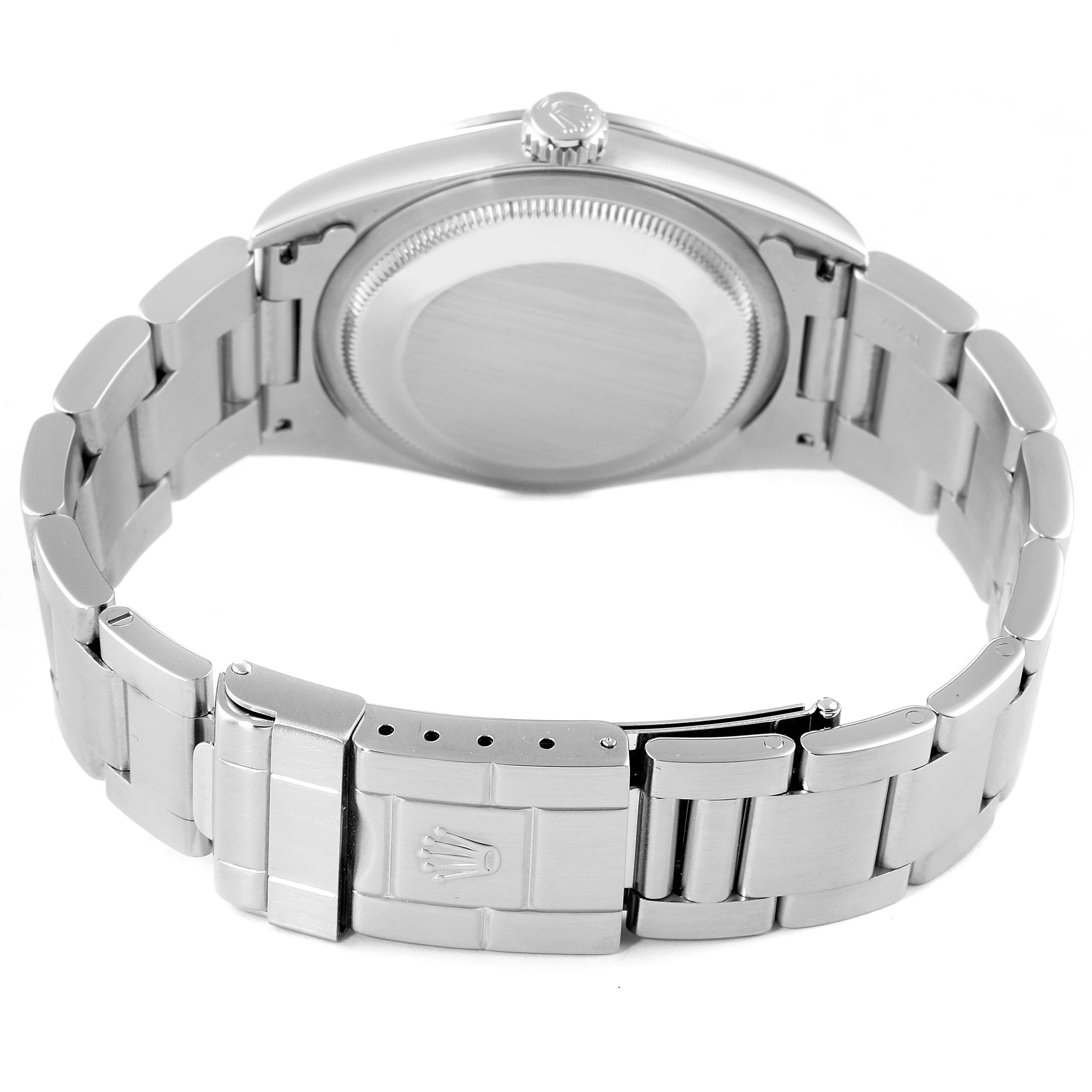 The image shows the back and clasp of a Rolex Explorer 14270 Men's Stainless Steel Black Dial 14270 Men's Stainless Steel Black Dial watch, highlighting its stainless steel bracelet and case back.