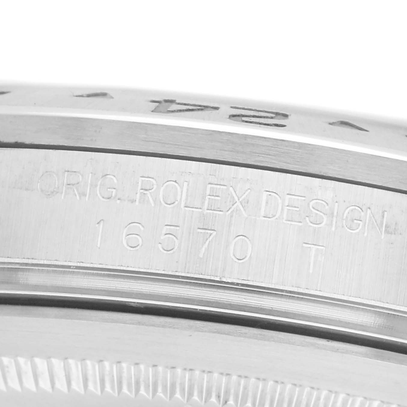 The image shows a close-up of the side of the Rolex Explorer 16570 Men
s Stainless Steel White Dial 16570 Men
s Stainless Steel White Dial model, highlighting the engraved model number and design details.