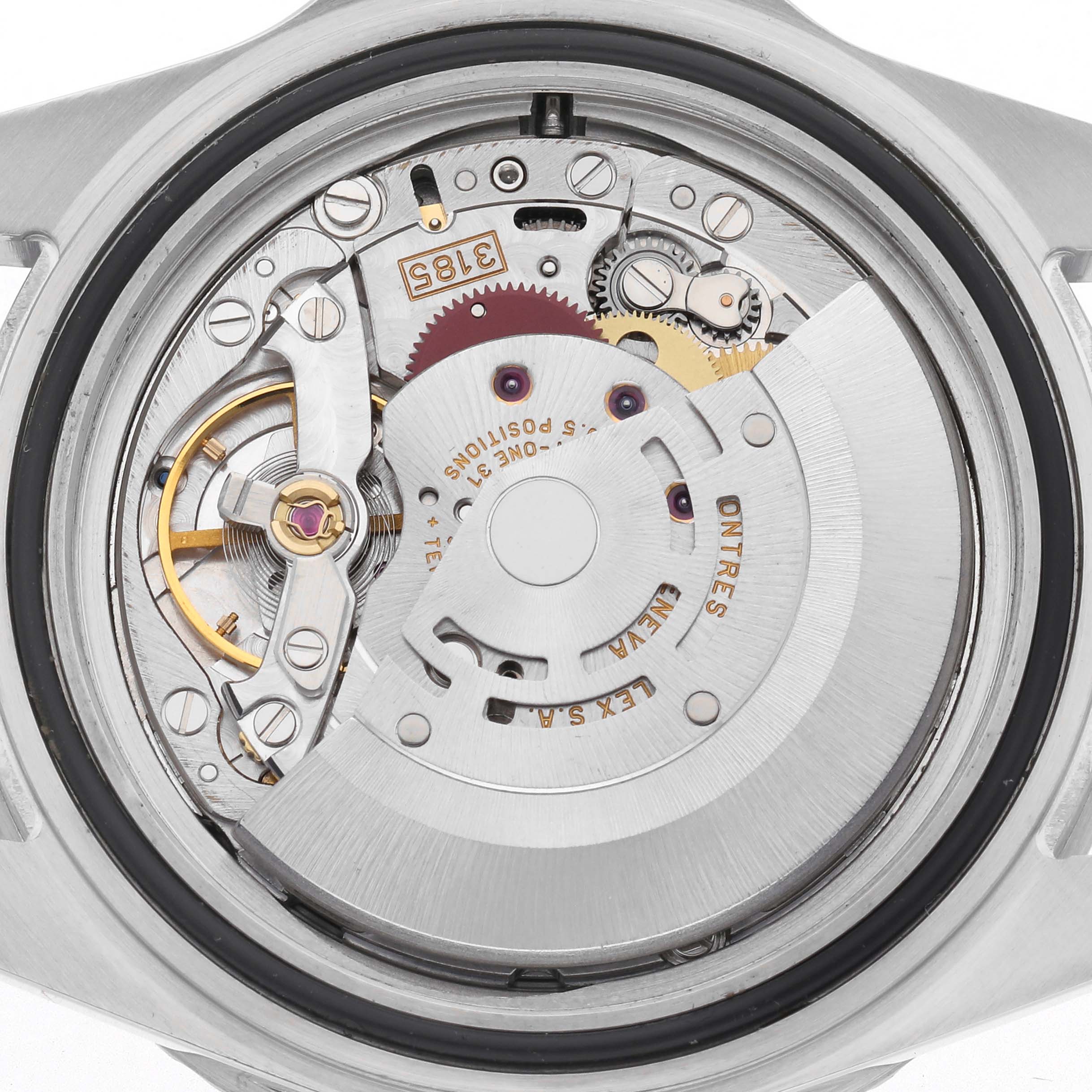 The image shows the movement of a Rolex GMT-Master 16710 Men
s Stainless Steel Black Dial 16710 Men
s Stainless Steel Black Dial, viewed from the back, highlighting gears and rotor.