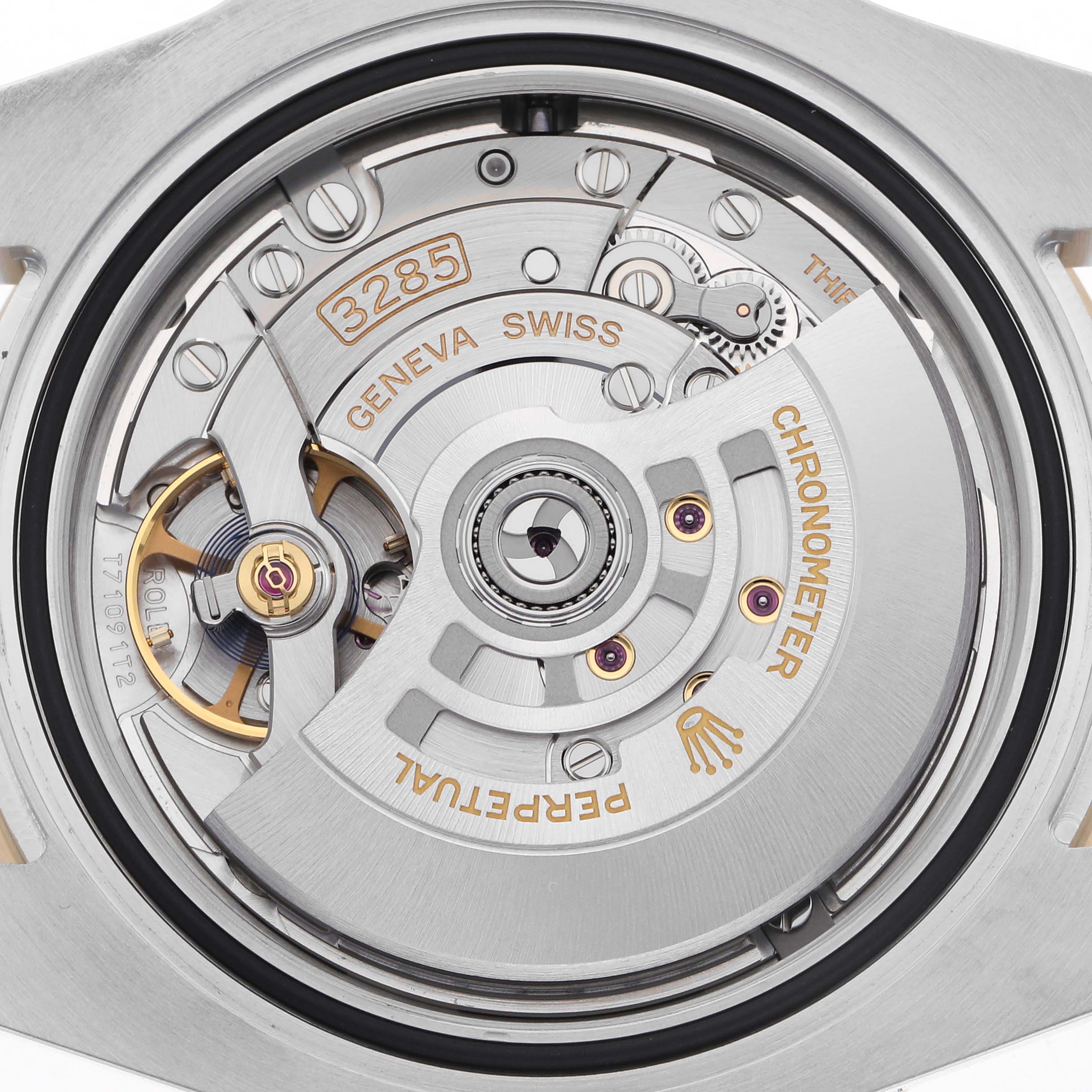 The image shows the movement of a Rolex GMT-Master 126713GRNR Men
s Steel and Gold (two tone) Black Dial 126713GRNR Men
s Steel and Gold (two tone) Black Dial, specifically the Caliber 3285 mechanism, viewed from the back.