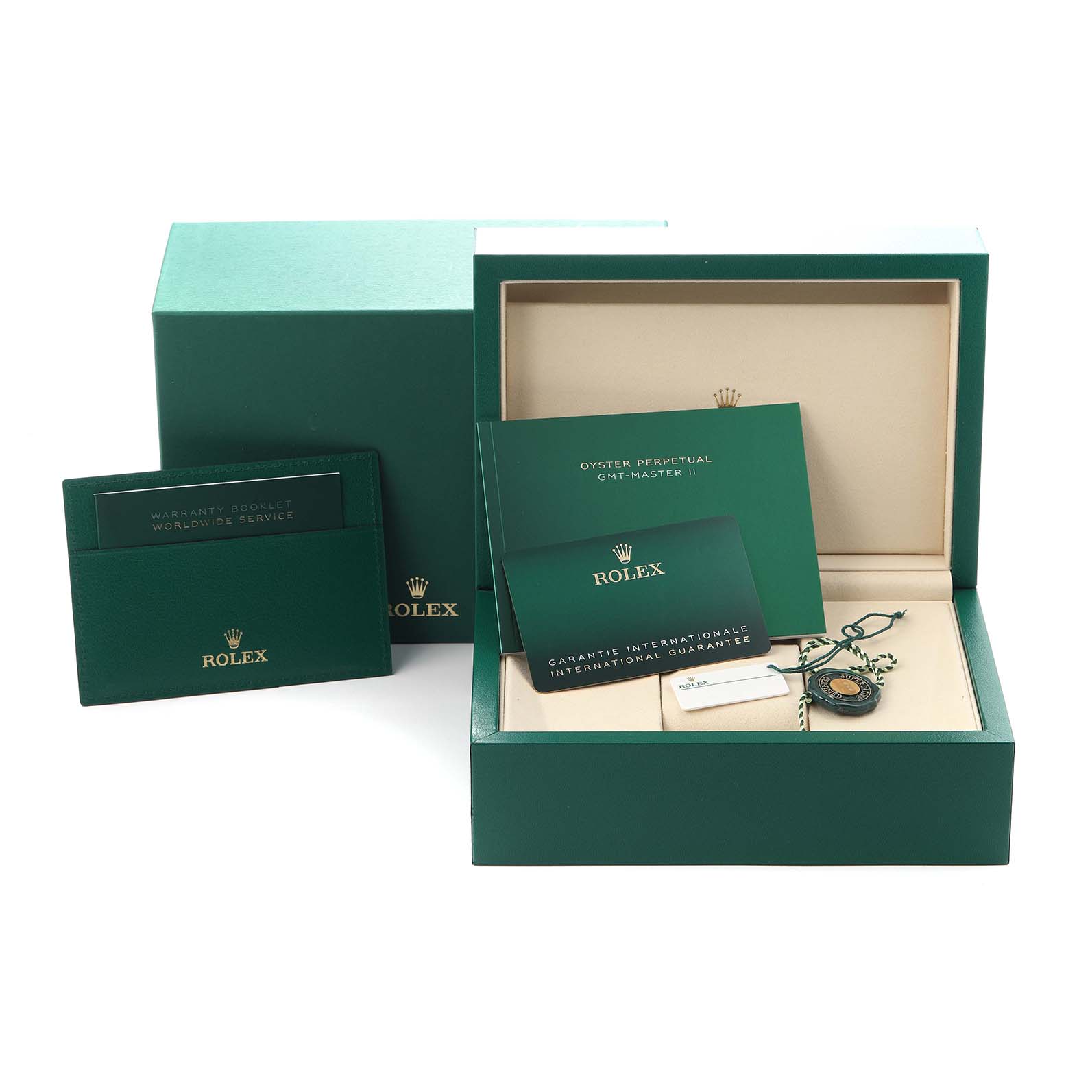 The image shows a Rolex GMT-Master 126713GRNR Men
s Steel and Gold (two tone) Black Dial 126713GRNR Men
s Steel and Gold (two tone) Black Dial watch box with booklets and a hang tag.