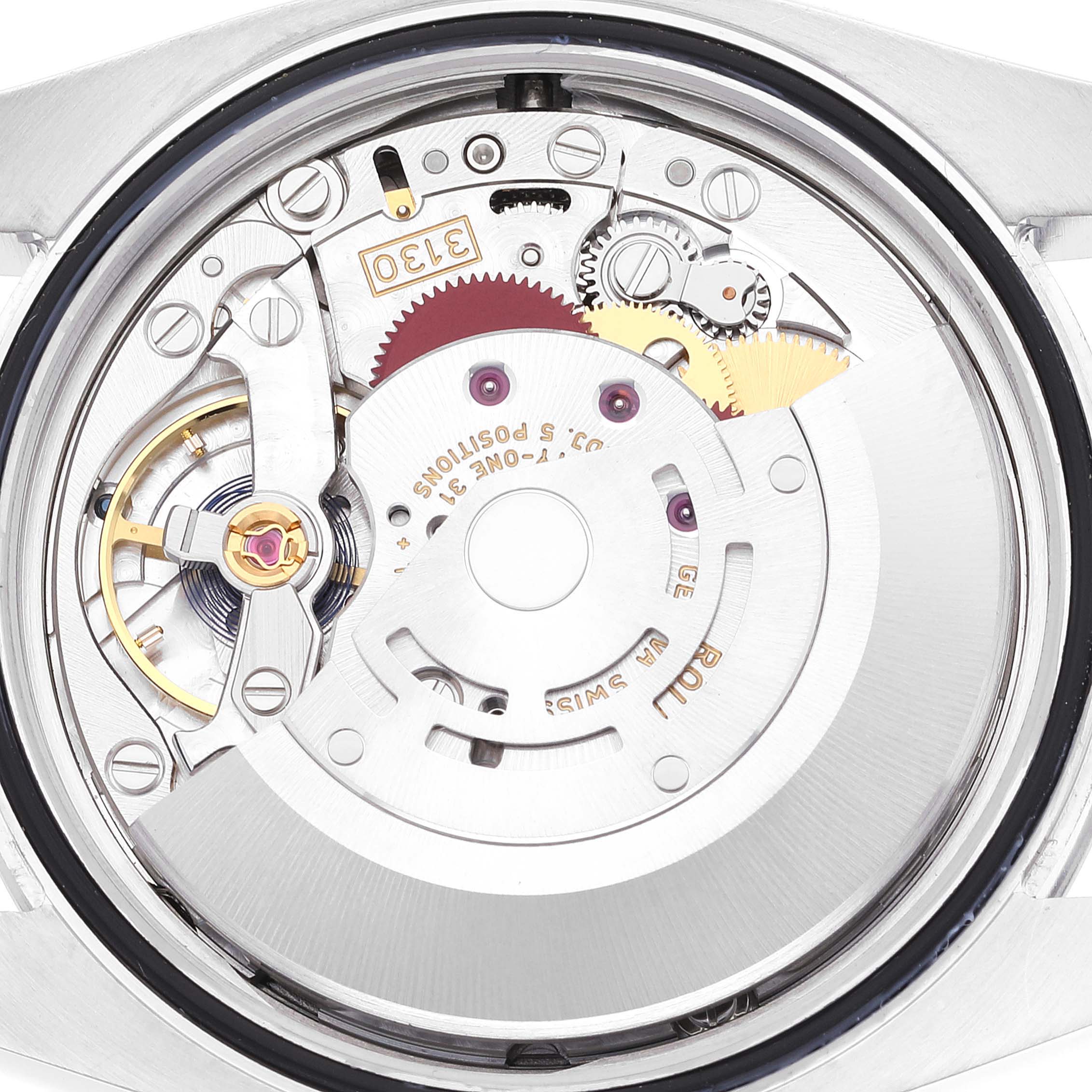 This image displays the inner mechanical parts of a Rolex Oyster Perpetual 116000 Men
s Stainless Steel Grey Dial 116000 Men
s Stainless Steel Grey Dial watch from a top-down angle.