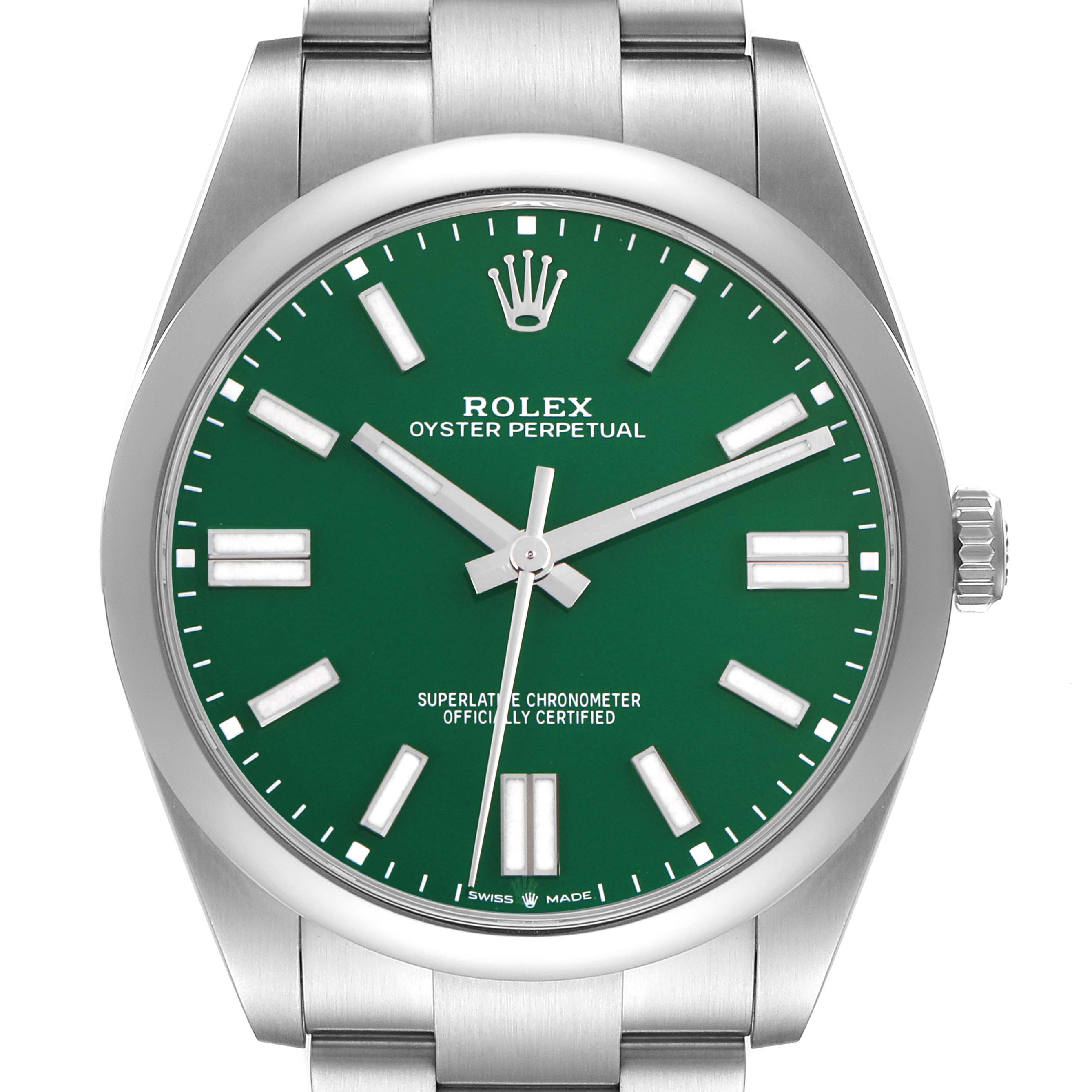 The image shows a front view of a Rolex Oyster Perpetual 124300 Men
s Stainless Steel Green Dial 124300 Men
s Stainless Steel Green Dial watch with a green dial and silver hour markers.