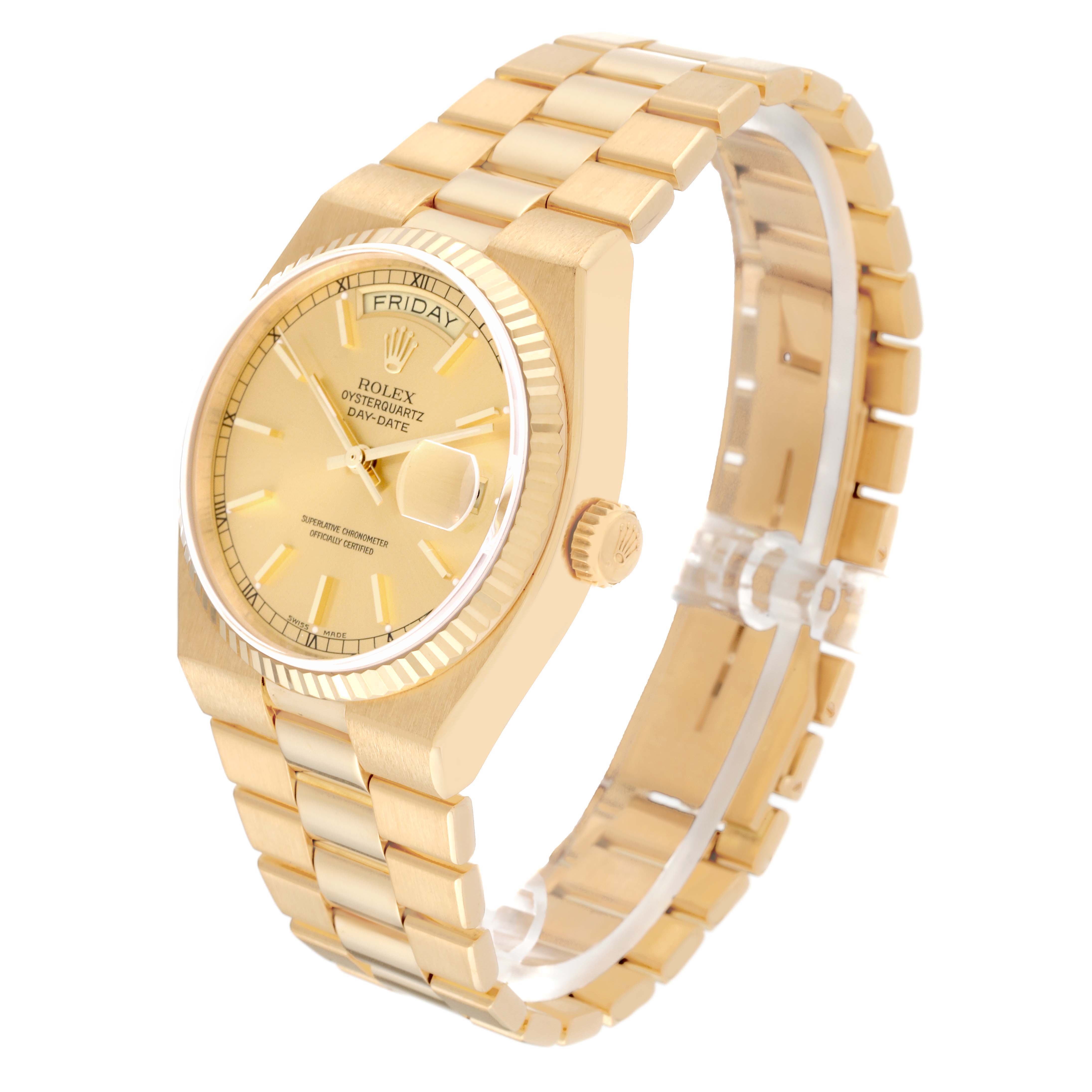 The Rolex Oysterquartz 19018 Men's Yellow Gold Champagne Dial 19018 Men's Yellow Gold Champagne Dial model is shown at an angle displaying its gold dial, fluted bezel, and bracelet with a three-link design.