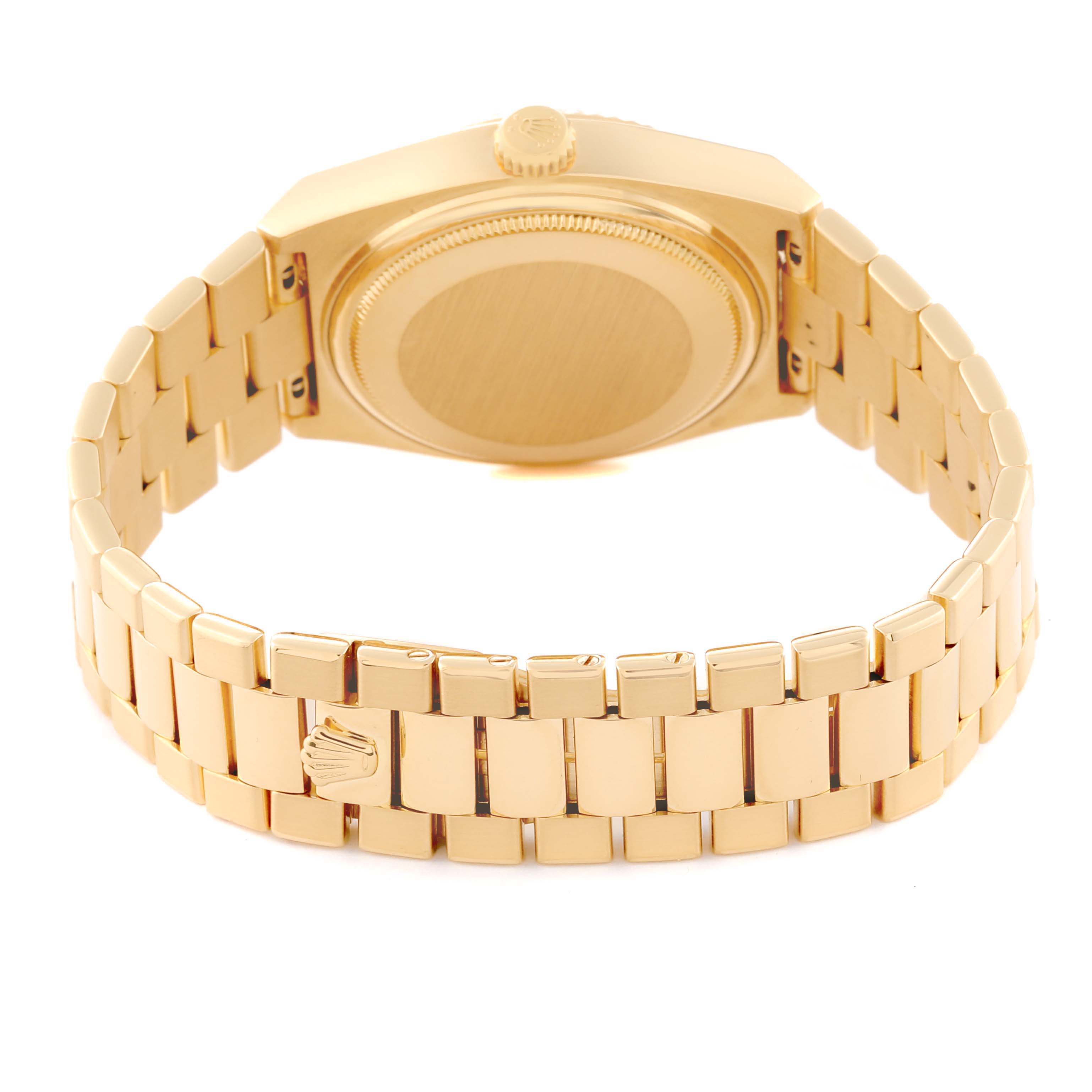 The image shows the back view of a Rolex Oysterquartz 19018 Men's Yellow Gold Champagne Dial 19018 Men's Yellow Gold Champagne Dial watch, highlighting its case back, crown, and bracelet.