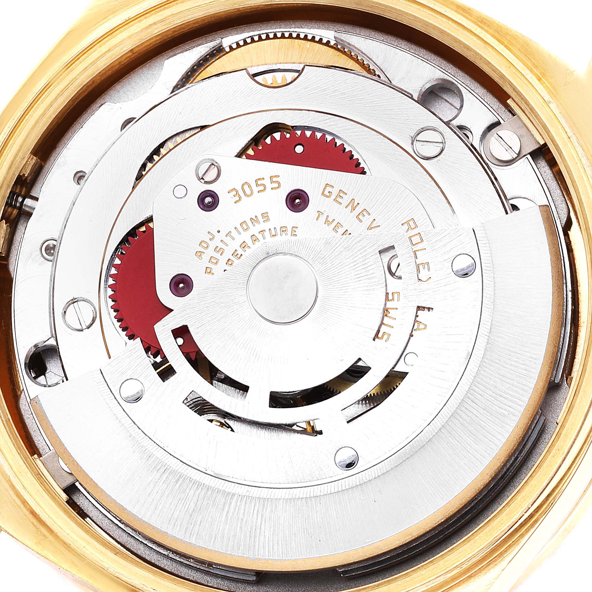 This image shows a close-up of the internal mechanism of a Rolex President 18138 Men
s Yellow Gold Champagne Dial 18138 Men
s Yellow Gold Champagne Dial model watch, highlighting its intricate gears and components.