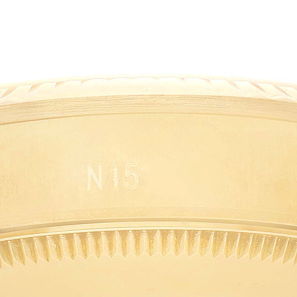 The image shows a close-up of the side and partially the bezel of the Rolex President 68238 Women's Yellow Gold Champagne Dial 68238 Women's Yellow Gold Champagne Dial model watch.