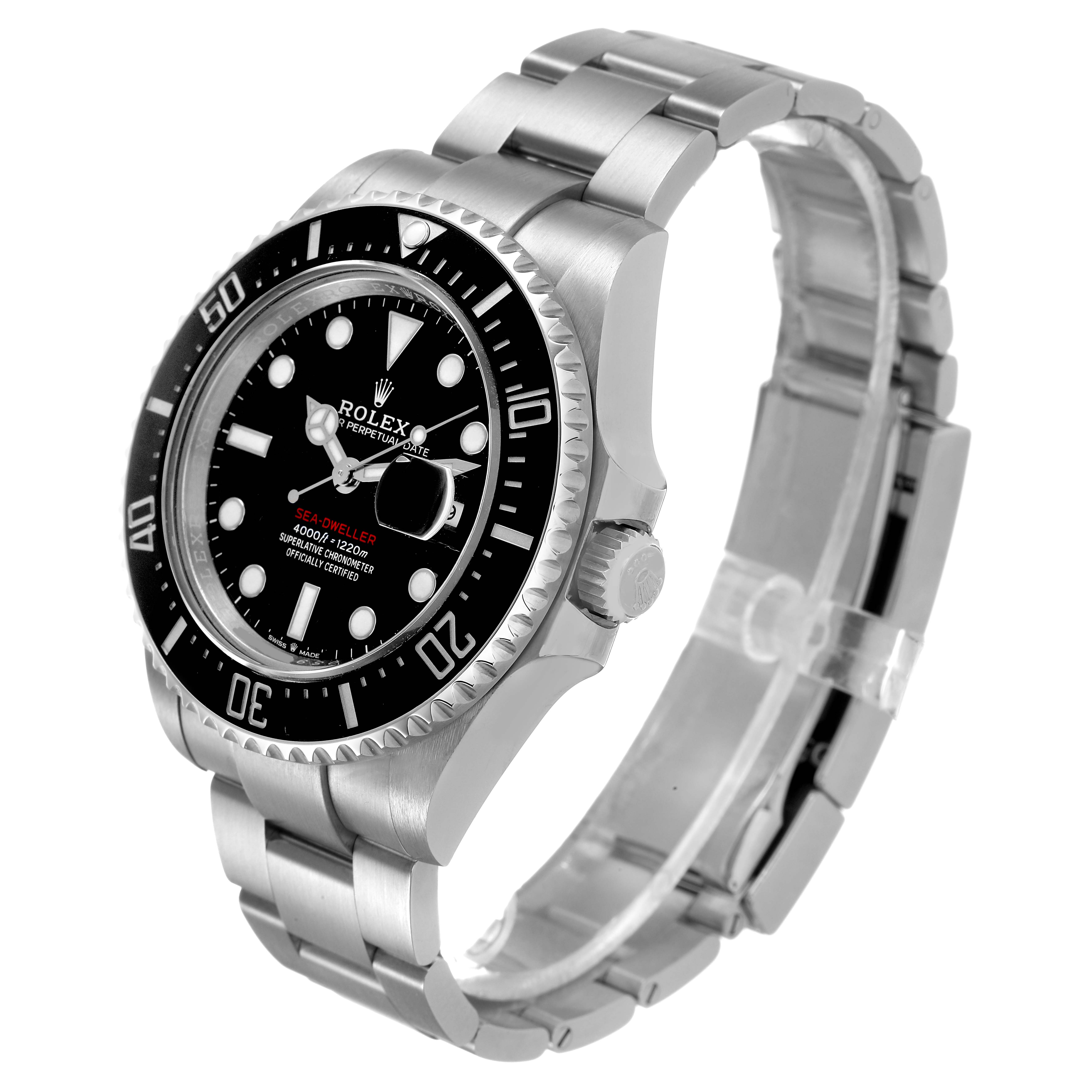 The Rolex Sea-Dweller 126600 Men's Stainless Steel Black Dial watch is shown at an angled side view, highlighting the case, bezel, crown, and partially open bracelet.