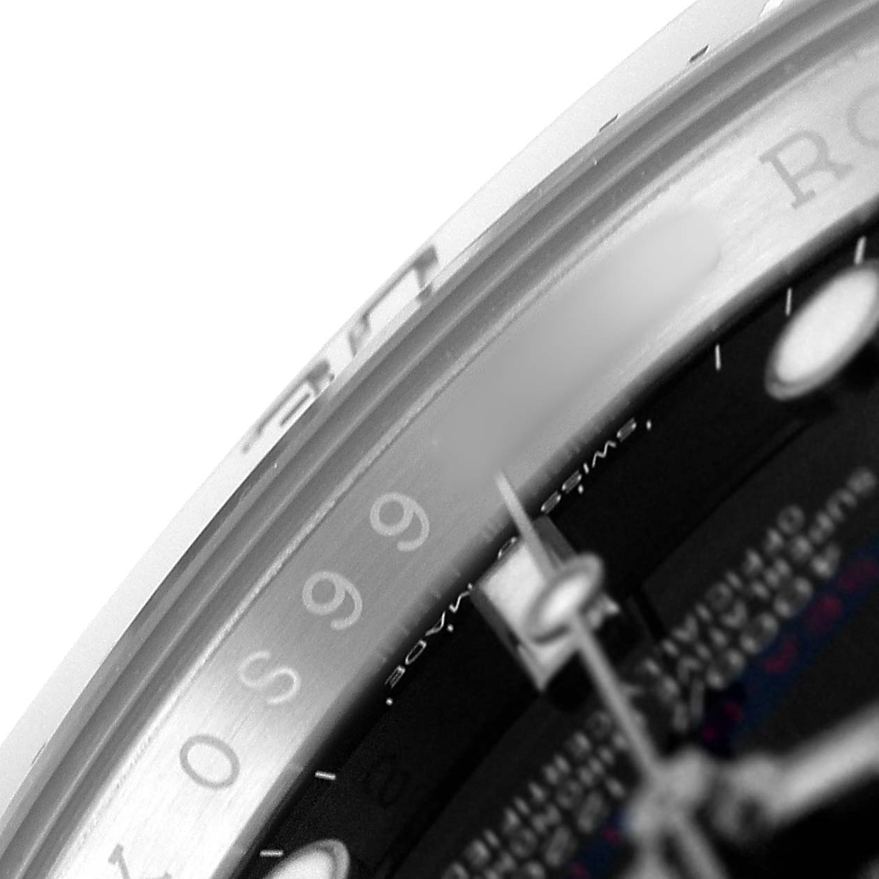 The image shows a close-up of the Rolex Sea-Dweller 126600 Men's Stainless Steel Black Dial watch's dial and bezel, focusing on the edge details and part of the hour markers.