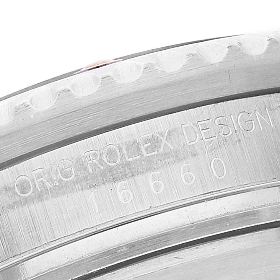 The image shows a close-up of the case back edge on a Rolex Sea-Dweller 16660 Men's Stainless Steel Black Dial 16660 Men's Stainless Steel Black Dial watch displaying engraved text.