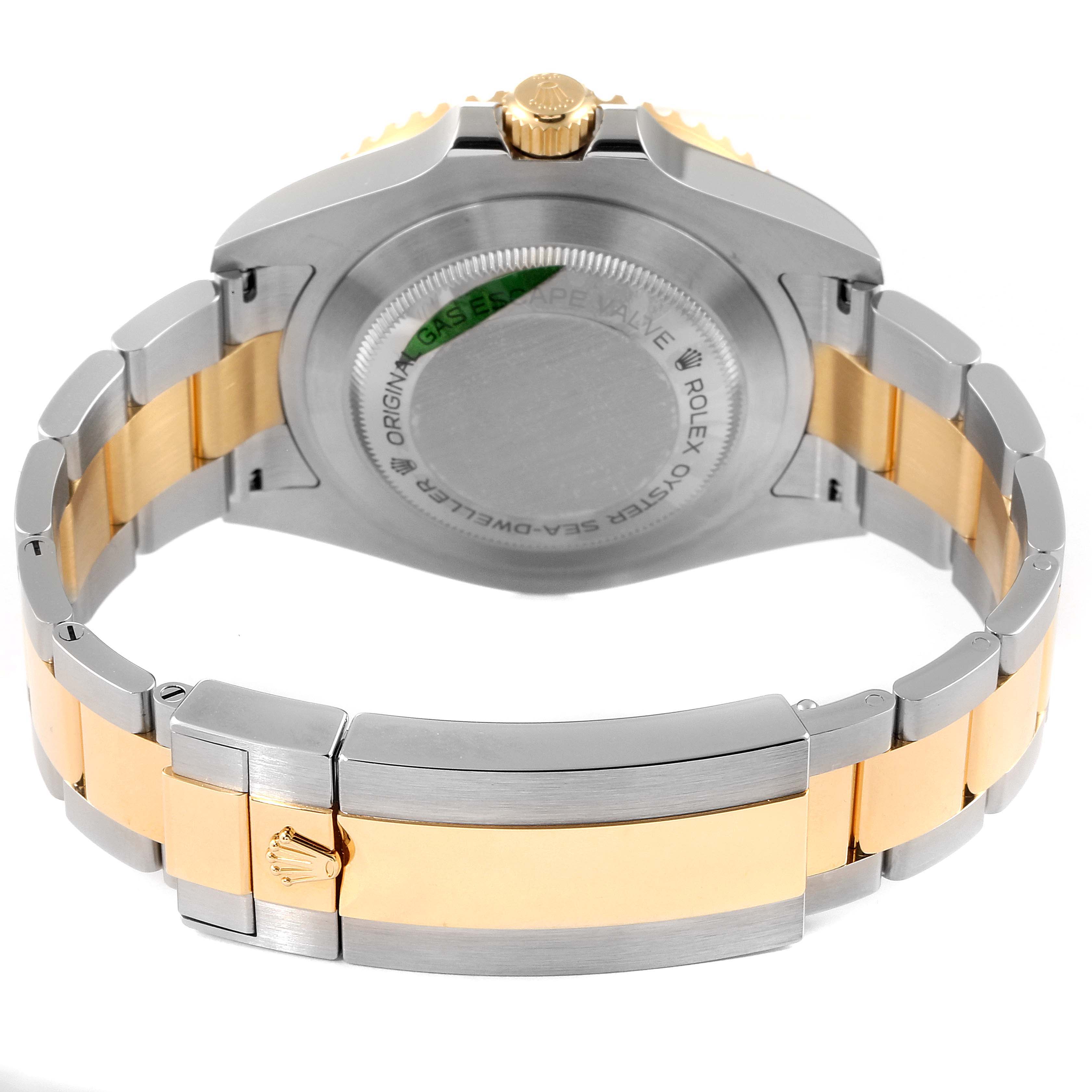 The image shows the back case and bracelet of a Rolex Sea-Dweller 126603 Men's Steel and Gold (two tone) Black Dial 126603 Men's Steel and Gold (two tone) Black Dial, with a focus on the clasp and stainless steel and gold links.