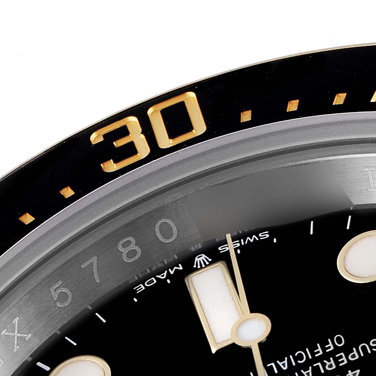This is a close-up view of the bezel, part of the dial, and markers of the Rolex Sea-Dweller 126603 Men's Steel and Gold (two tone) Black Dial 126603 Men's Steel and Gold (two tone) Black Dial watch.