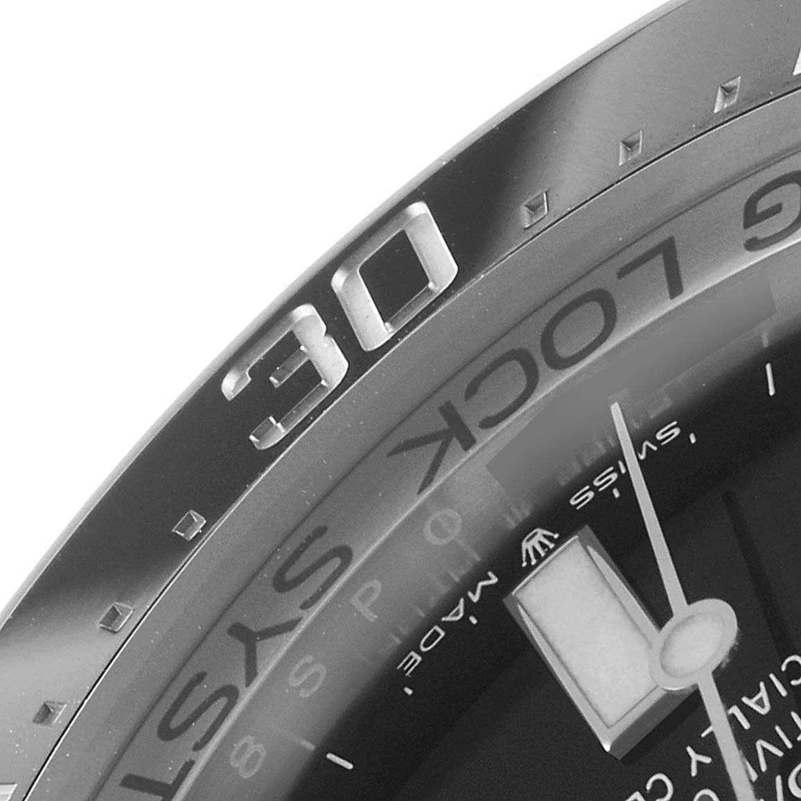This image shows a close-up of the bezel, part of the dial, and the hand of a Rolex Sea-Dweller 126660 Men
s Stainless Steel Blue Dial 126660 Men
s Stainless Steel Blue Dial watch.