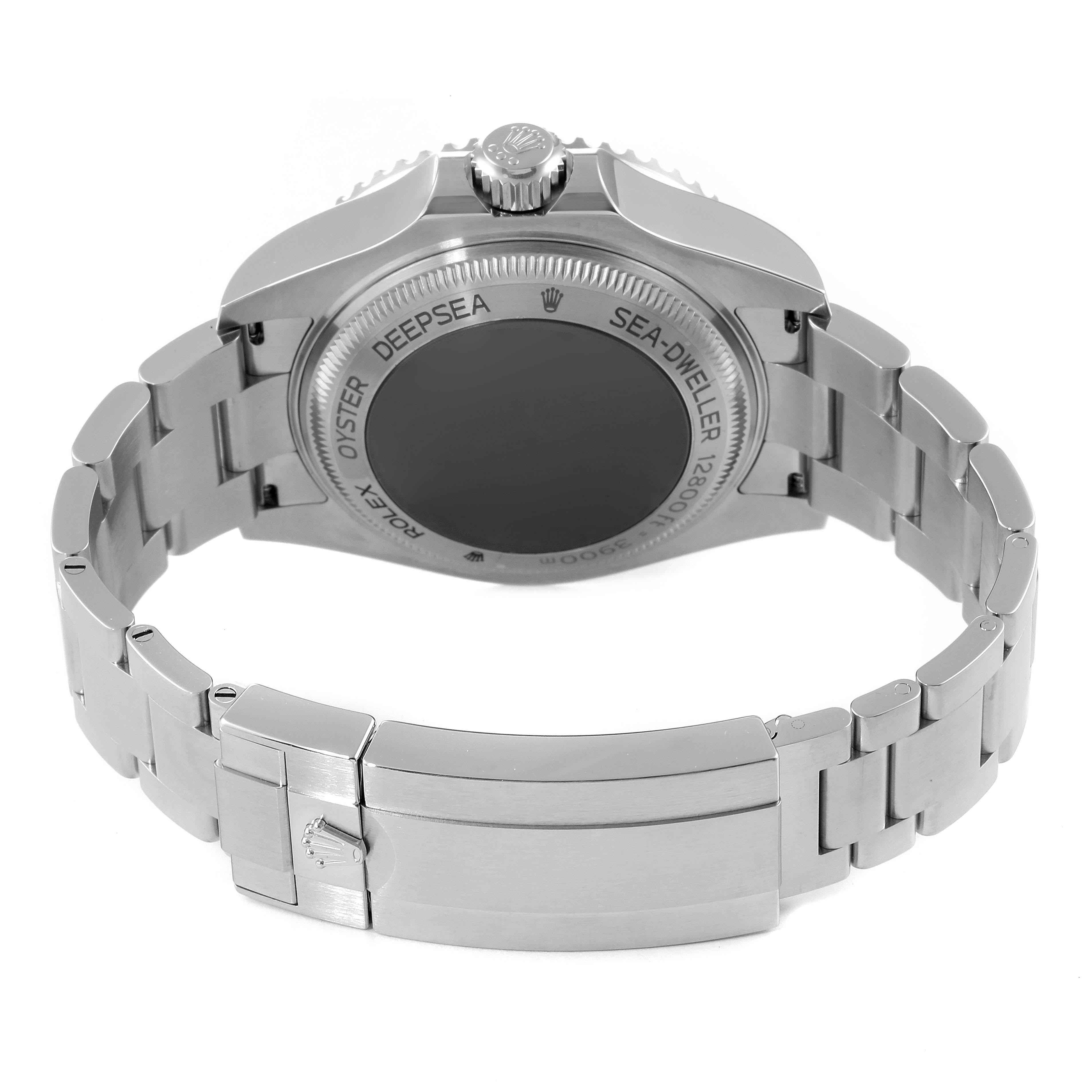 The image shows the back view of a Rolex Sea-Dweller 126660 Men
s Stainless Steel Blue Dial 126660 Men
s Stainless Steel Blue Dial watch, highlighting its case back, bracelet, and clasp.