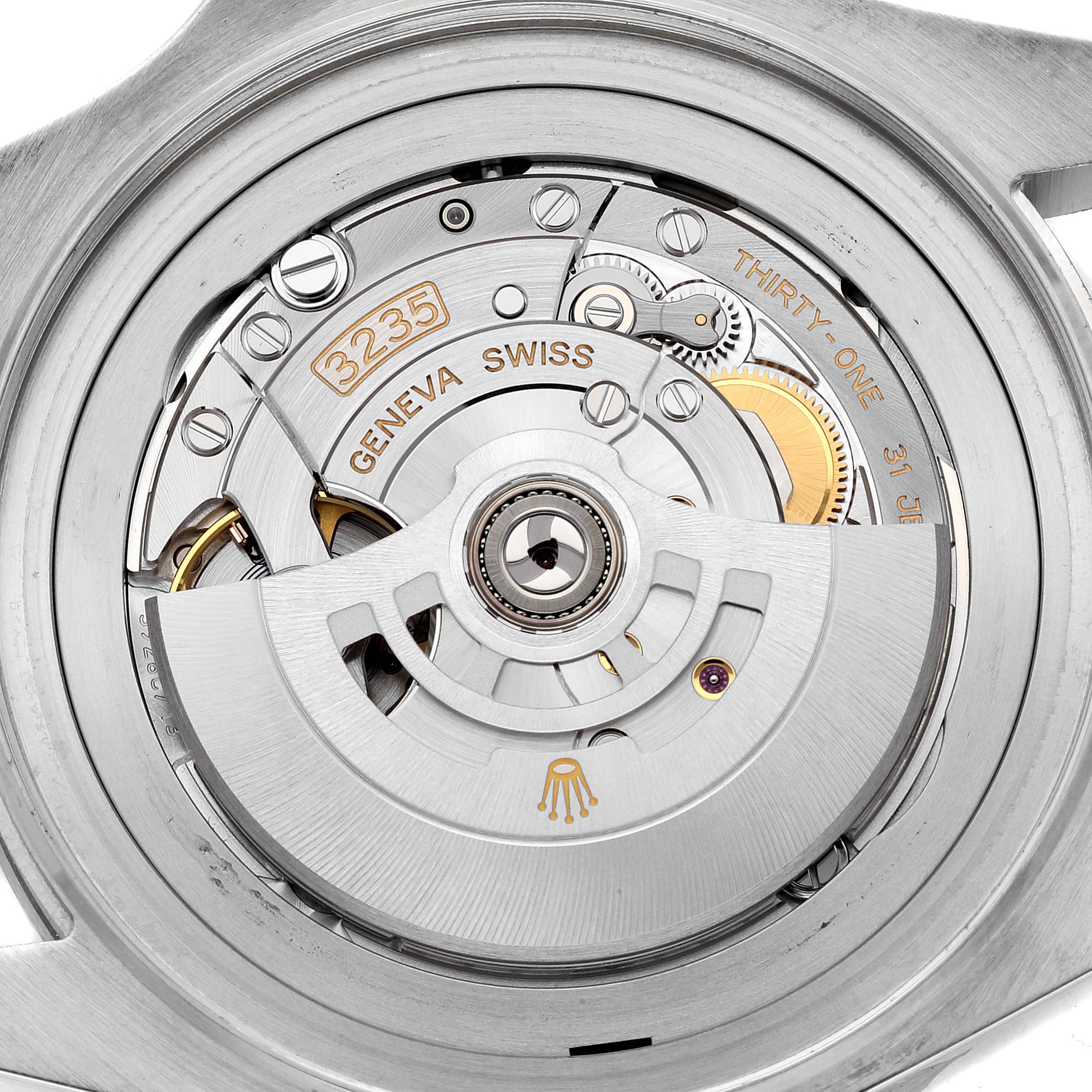 This image shows the intricate movement mechanism of a Rolex Sea-Dweller 126660 Men
s Stainless Steel Blue Dial 126660 Men
s Stainless Steel Blue Dial watch from a rear angle.