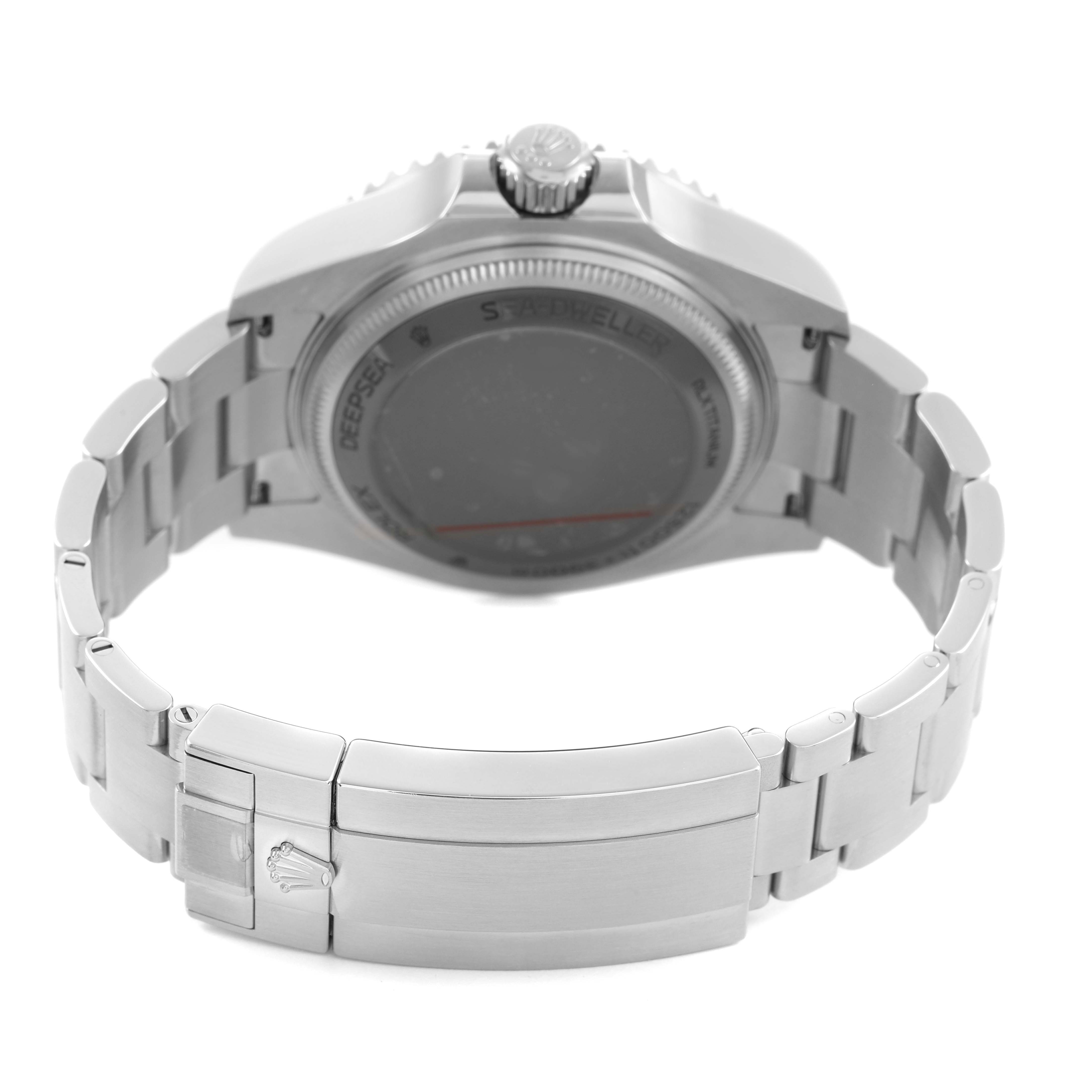 The image shows the back and clasp of a Rolex Sea-Dweller 126660 Men's Stainless Steel Blue Dial watch, highlighting its bracelet and crown.