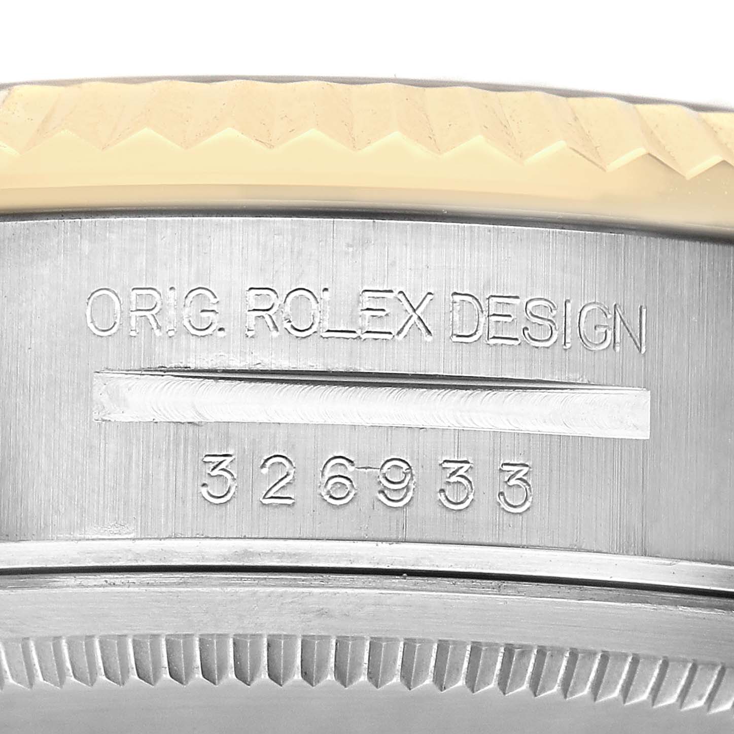 The image shows a close-up of the case side for a Rolex Sky-Dweller 326933 Men's Steel and Gold (two tone) Black Dial, featuring engraved design details and model number.