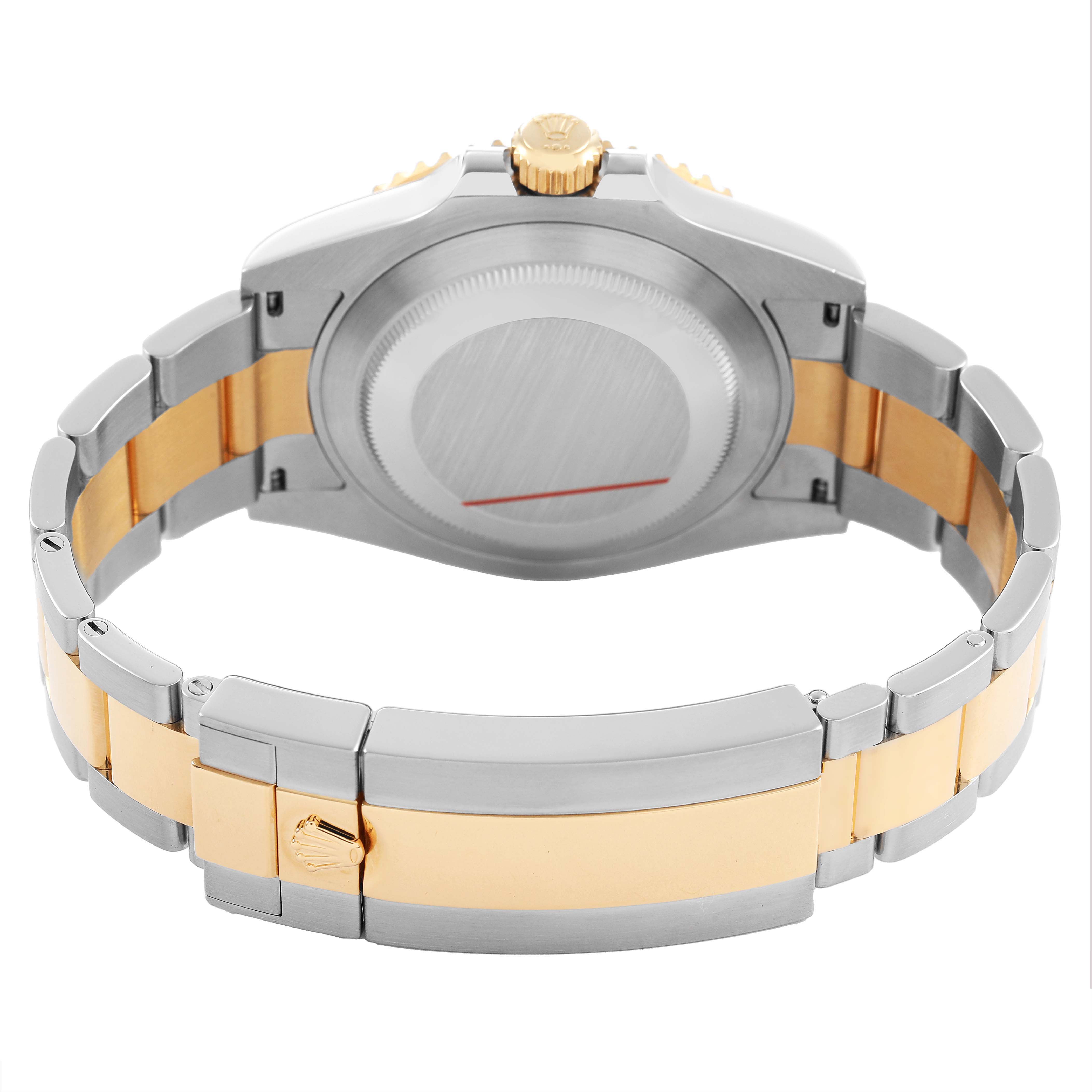 The Rolex Submariner M126613LN-0002 Men's Steel and Gold (two tone) Black Dial watch is shown from the back, highlighting the case back, crown, and two-tone bracelet.