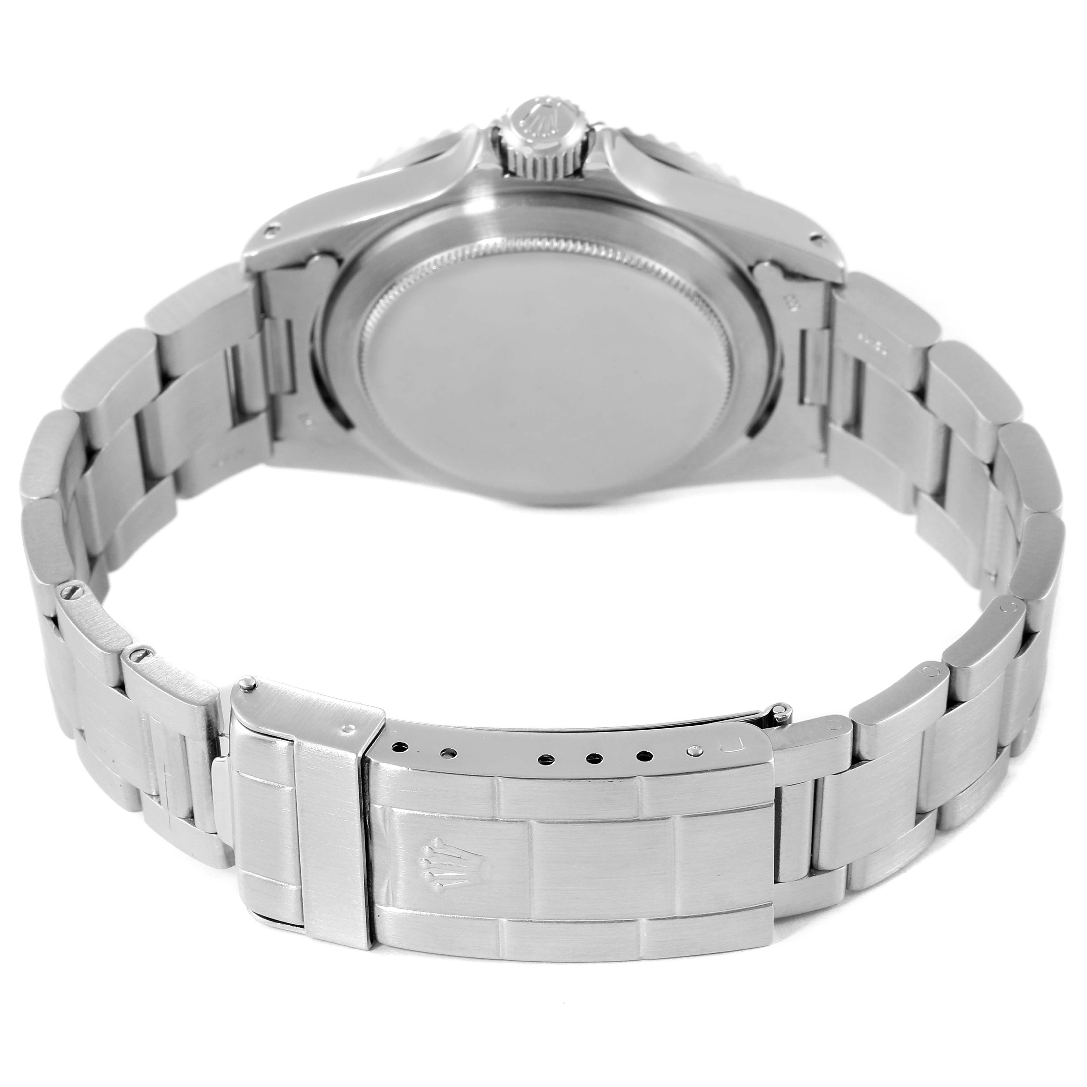 The image shows the back view of a Rolex Submariner 5513 Men's Stainless Steel Black Dial 5513 Men's Stainless Steel Black Dial model, highlighting the case back, crown, and metal bracelet with clasp.