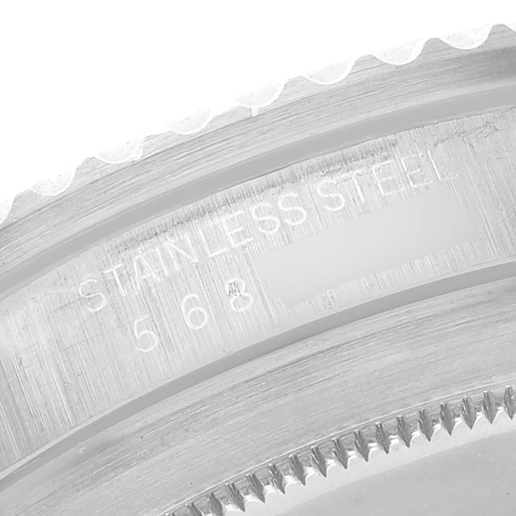 The image shows a close-up of the stainless steel bezel with engravings on a Rolex Submariner 5513 Men's Stainless Steel Black Dial 5513 Men's Stainless Steel Black Dial watch.