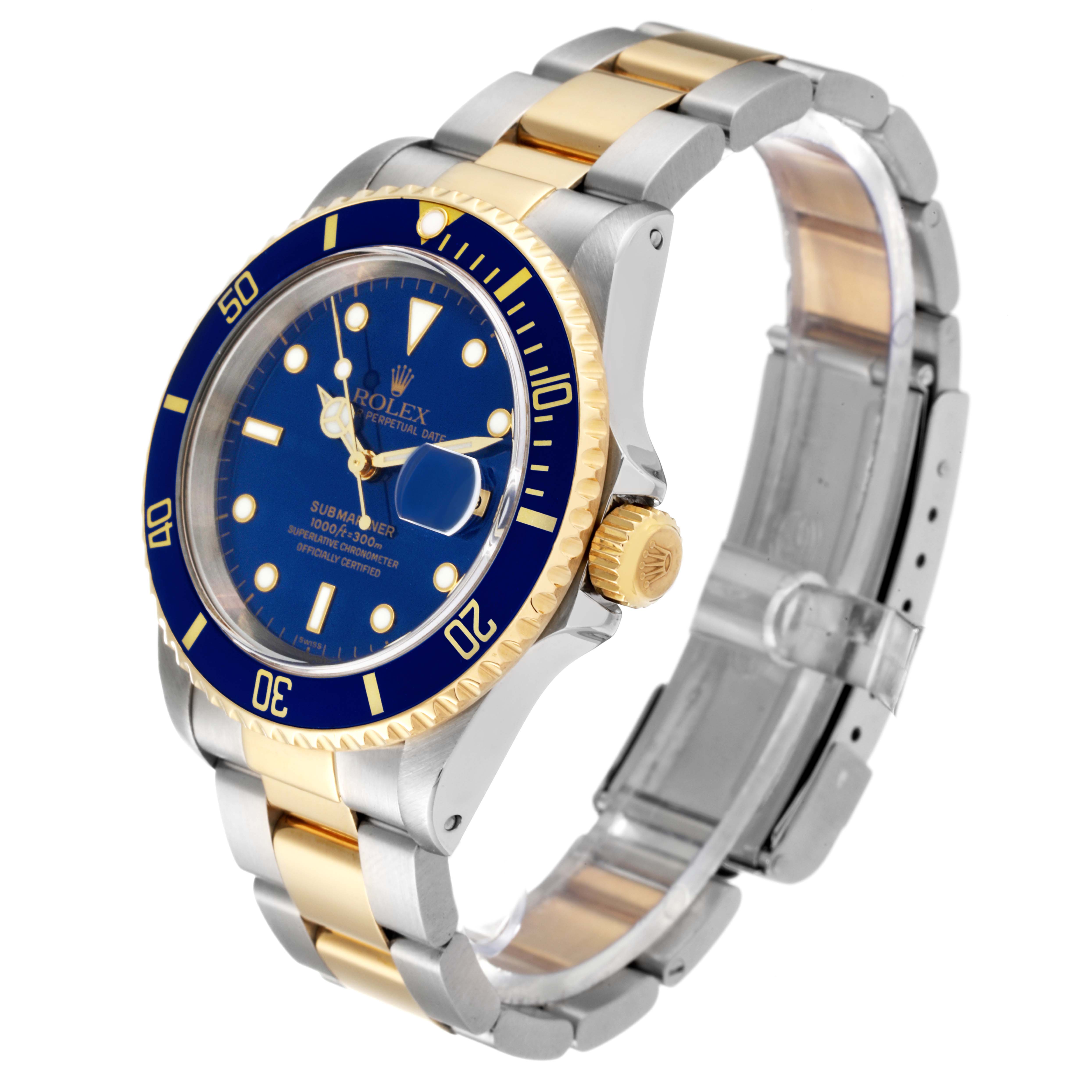 This image shows a Rolex Submariner 16613 Men's Steel and Gold (two tone) Blue Dial 16613 Men's Steel and Gold (two tone) Blue Dial watch taken at an angle highlighting the dial, bezel, crown, and bracelet.