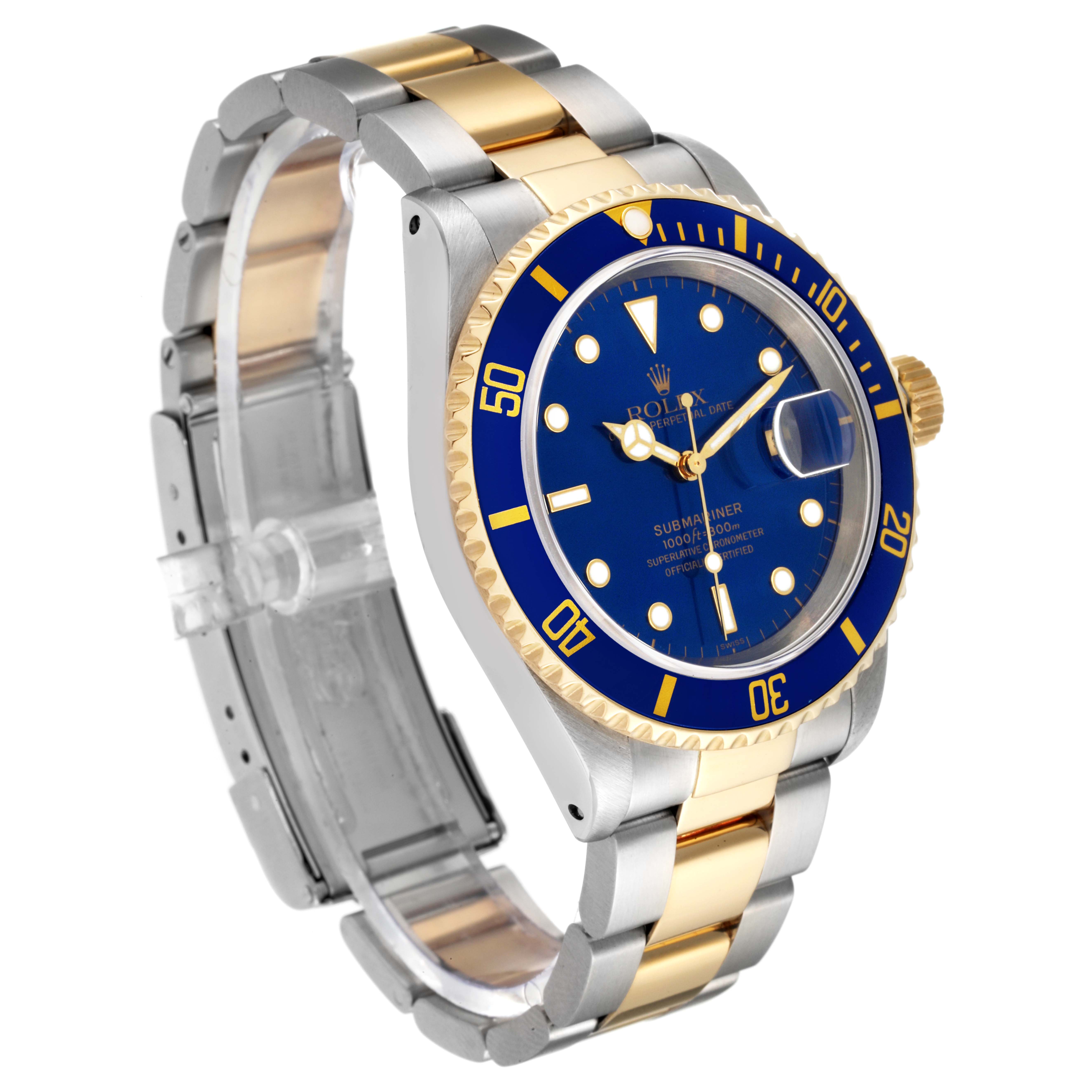 This image shows a Rolex Submariner 16613 Men's Steel and Gold (two tone) Blue Dial 16613 Men's Steel and Gold (two tone) Blue Dial watch at a three-quarter angle, highlighting its blue dial, gold bezel, and two-tone metal bracelet.