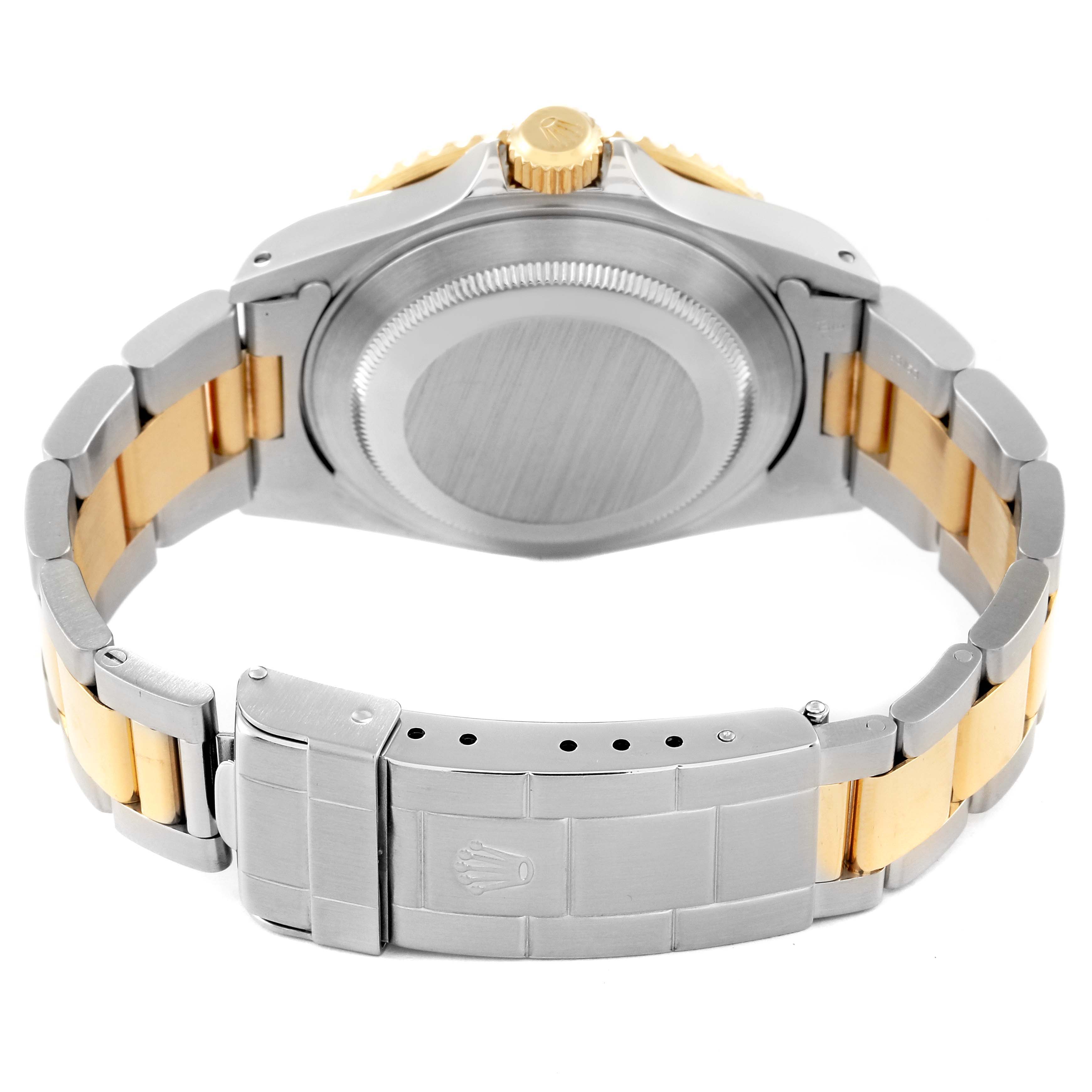 The image shows the case back and clasp of a Rolex Submariner 16613 Men's Steel and Gold (two tone) Blue Dial 16613 Men's Steel and Gold (two tone) Blue Dial, viewed from the rear.