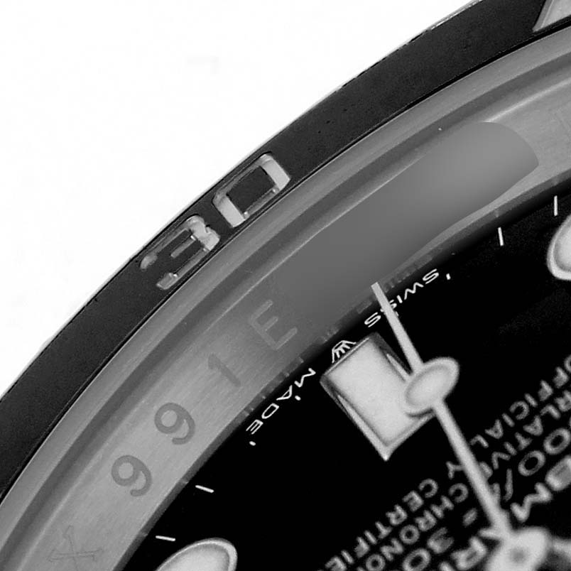The image shows a close-up of the bezel and part of the dial of a Rolex Submariner 126610LN Men's Stainless Steel Black Dial watch.