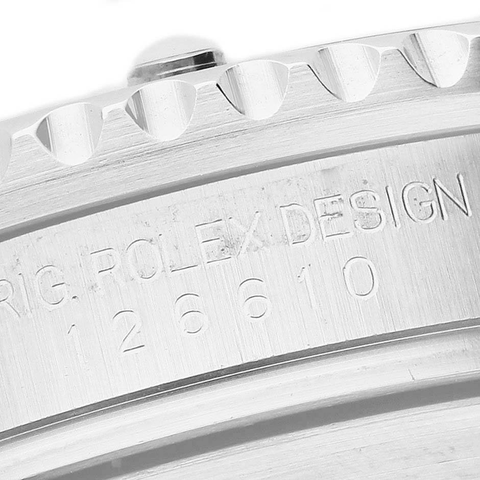 The image shows a close-up of the case back edge and serial engraving on the Rolex Submariner 126610LN Men's Stainless Steel Black Dial.