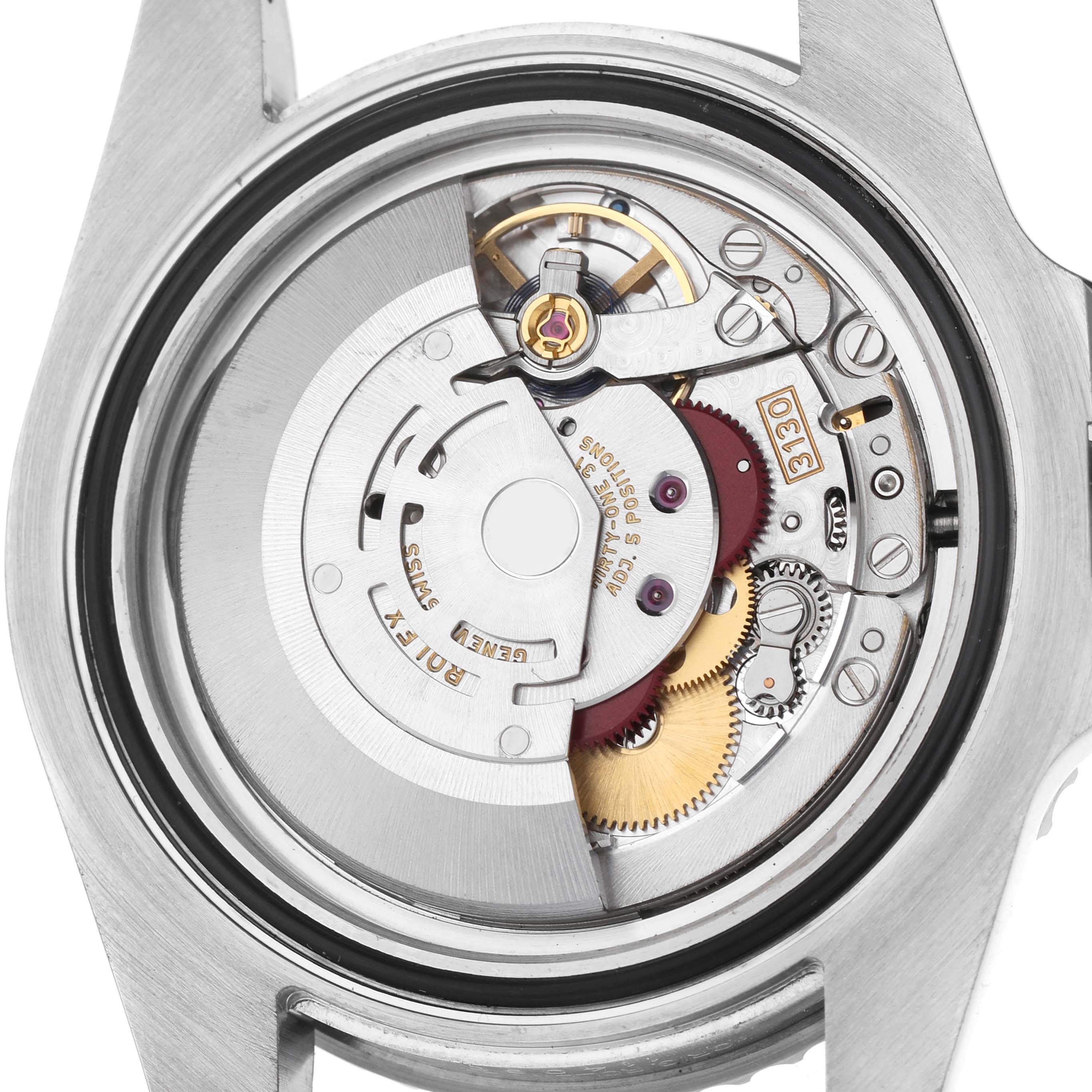 The image shows the back view of a Rolex Submariner 114060 Men's Stainless Steel Black Dial, highlighting its internal movement components.