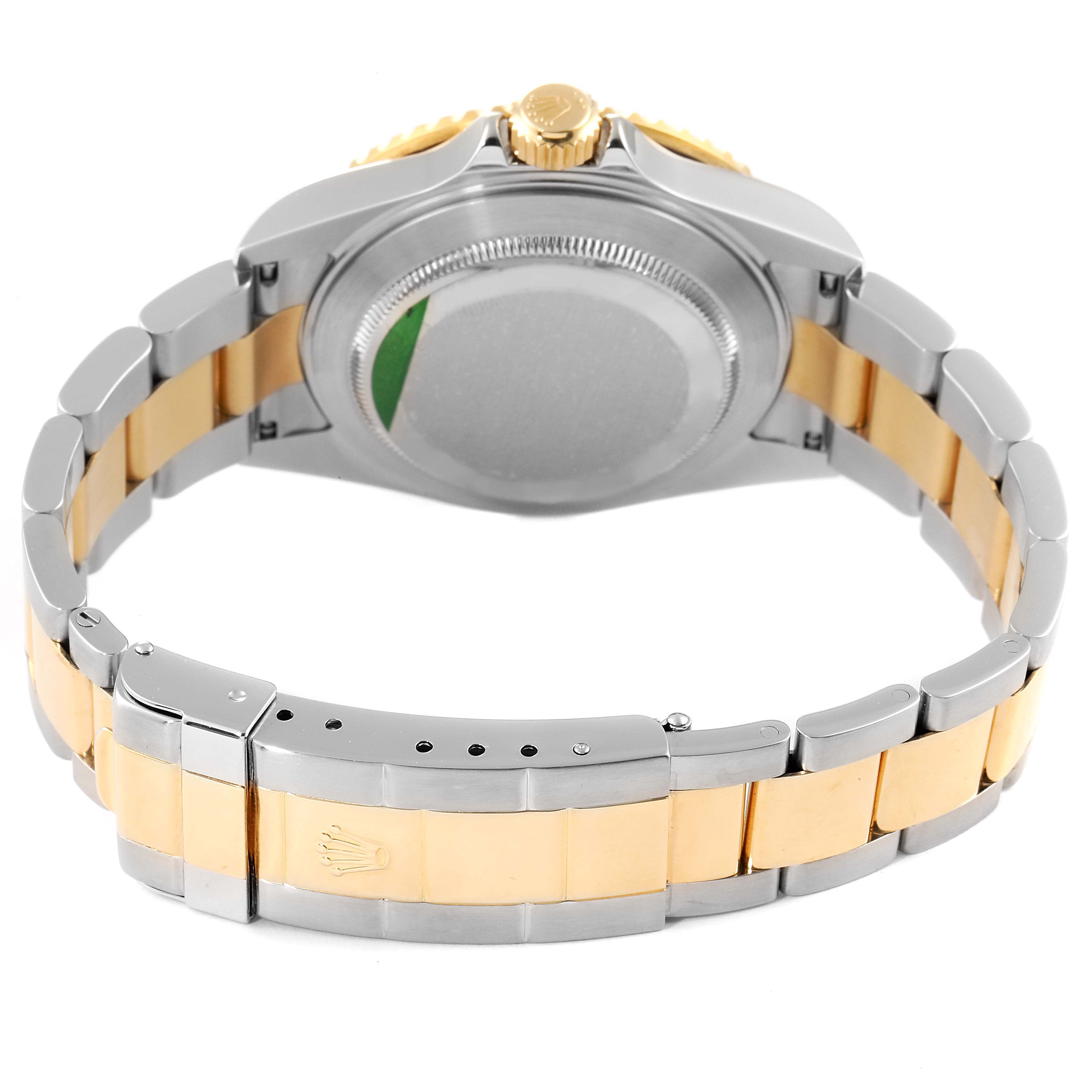 The image shows the back view of a Rolex Submariner 16613 Men
s Steel and Gold (two tone) Blue Dial 16613 Men
s Steel and Gold (two tone) Blue Dial watch, highlighting the case back and two-tone metal bracelet.