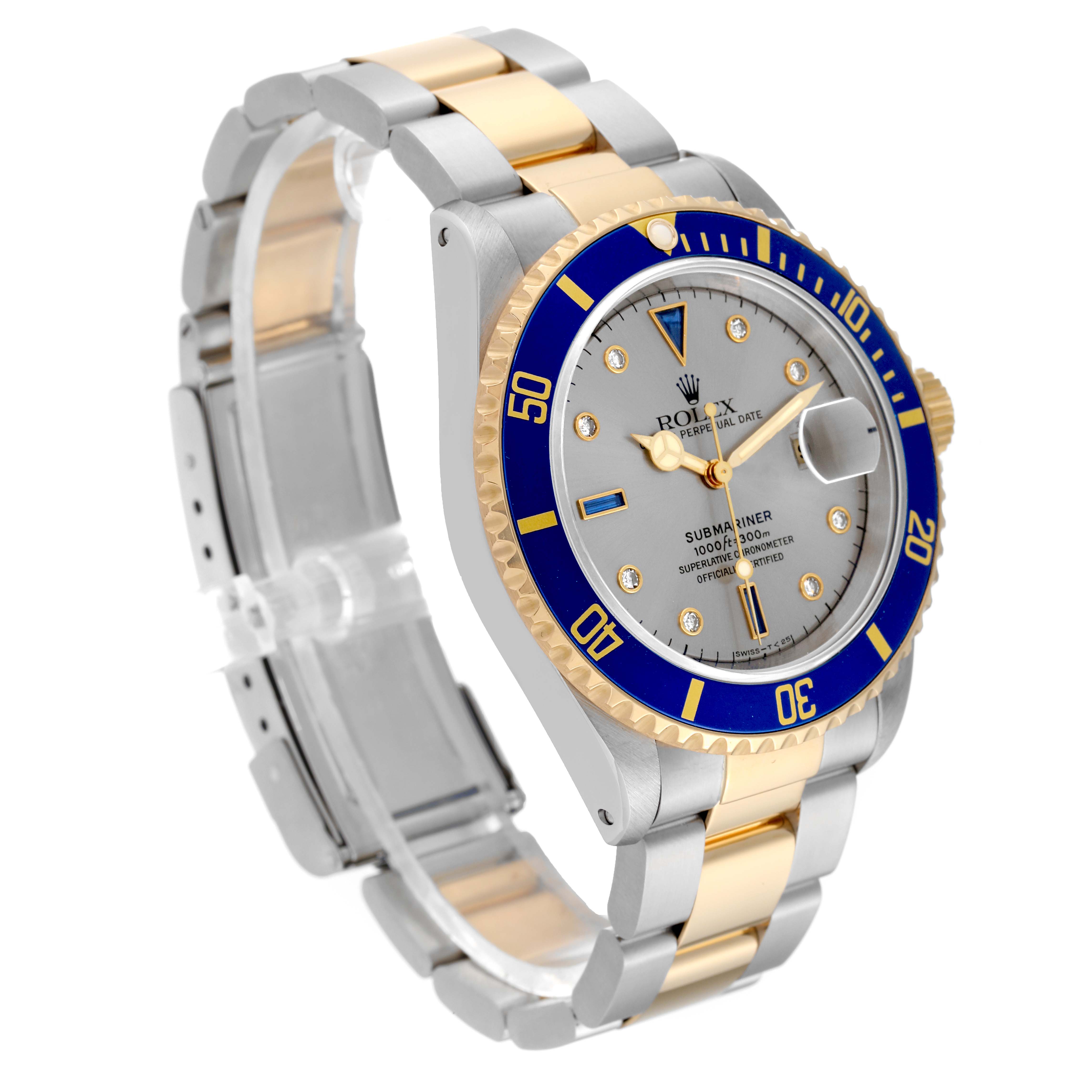 The Rolex Submariner 16613 Men's Steel and Gold (two tone) Silver Dial 16613 Men's Steel and Gold (two tone) Silver Dial watch is shown at a slight angle, highlighting the dial, bezel, case, and two-tone bracelet.