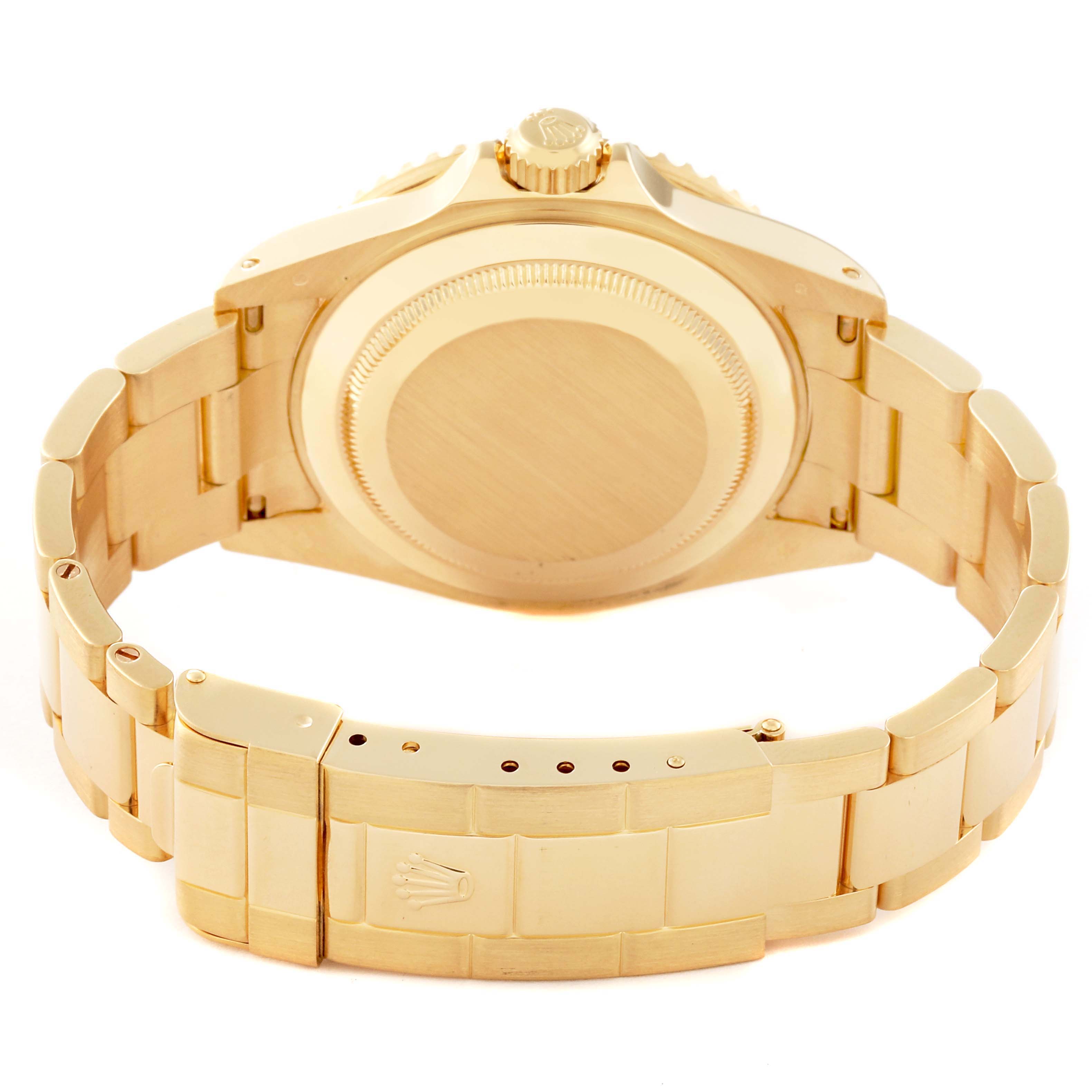 This image shows the back view of a Rolex Submariner 16618 Men's Yellow Gold Blue Dial 16618 Men's Yellow Gold Blue Dial, highlighting its gold bracelet, clasp, and case back.