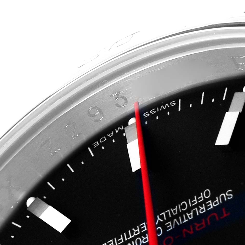 The image shows a close-up of the bezel and dial of a Rolex Turn-o-Graph 116264 Men
s Stainless Steel Black Dial 116264 Men
s Stainless Steel Black Dial, highlighting the red second hand and "Swiss Made" text.