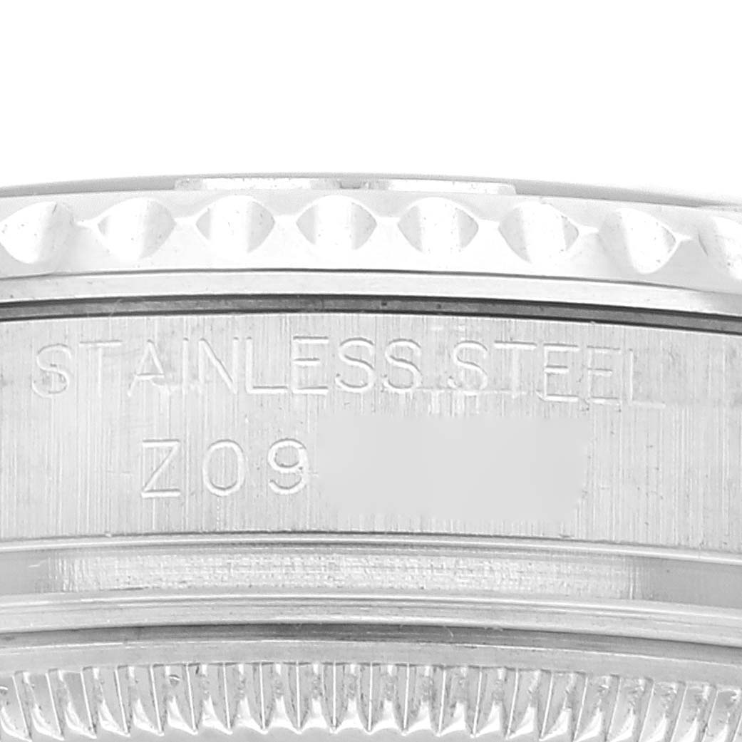 This image shows a close-up of the case side of a Rolex Yacht-Master 168622 Men
s Stainless Steel Silver Dial 168622 Men
s Stainless Steel Silver Dial watch, highlighting the stainless steel and part of the reference number.
