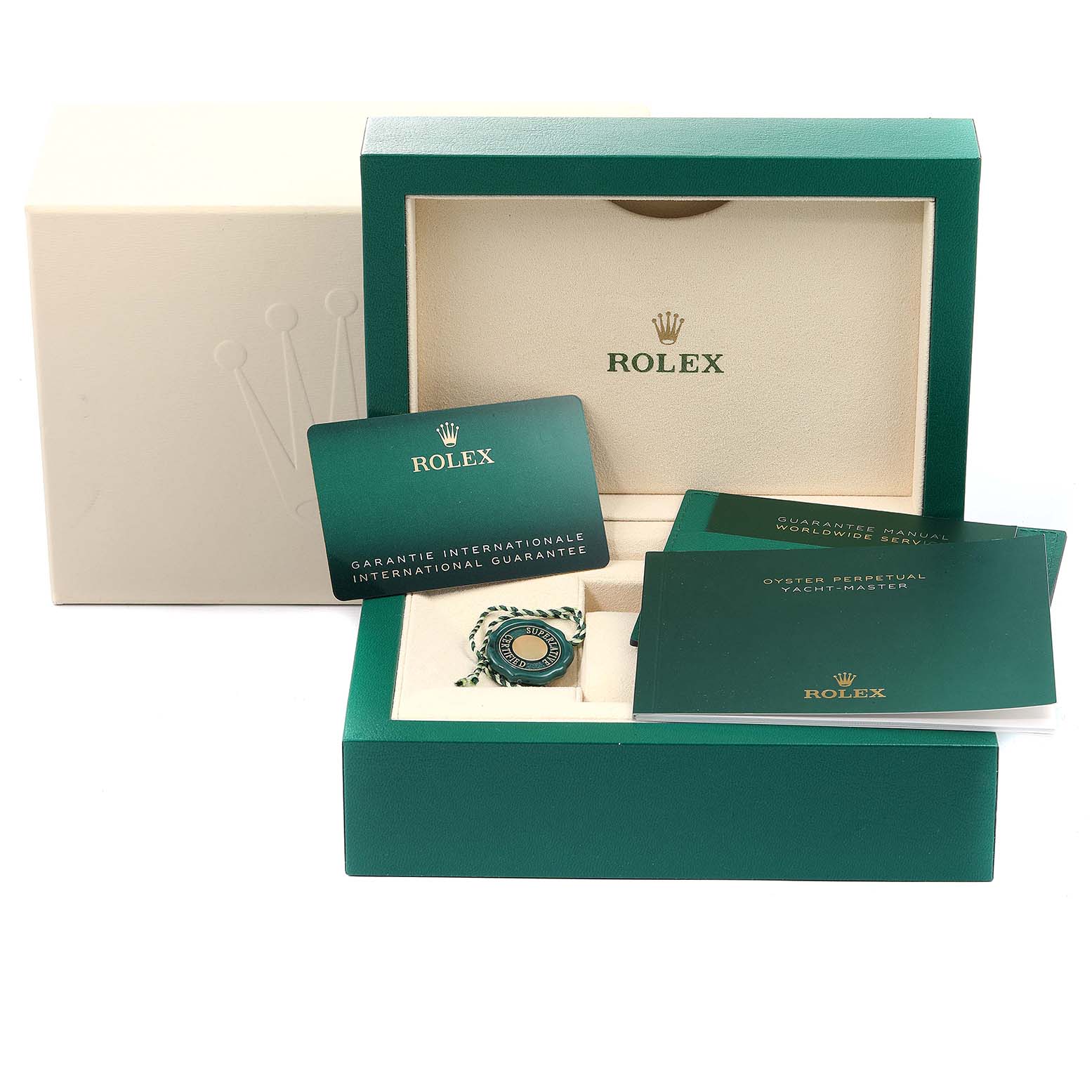 The image shows the packaging, guarantee cards, manual, and accessories for a Rolex Yacht-Master 126622 Men
s Stainless Steel Grey Dial 126622 Men
s Stainless Steel Grey Dial watch at an angle.