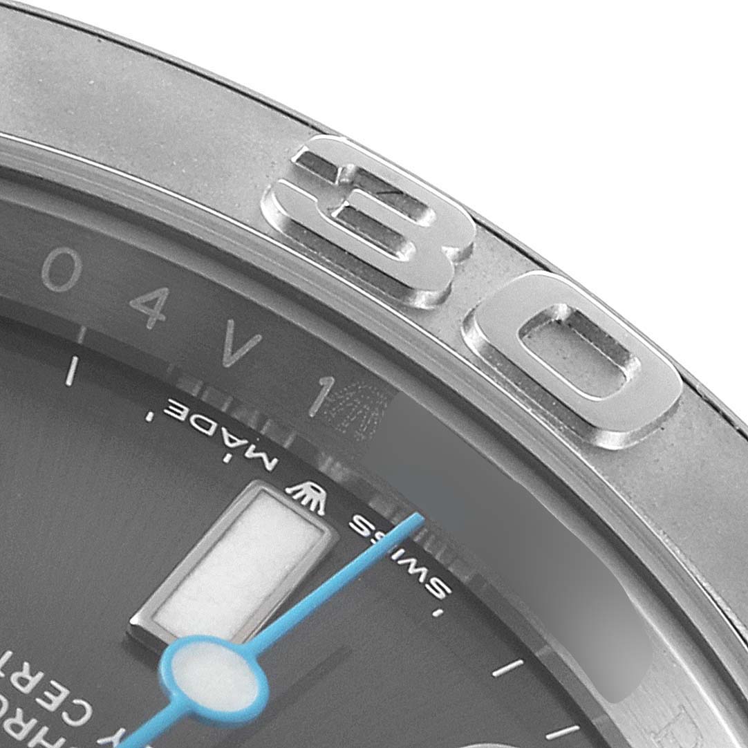 This close-up image shows the bezel and part of the dial of a Rolex Yacht-Master 126622 Men
s Stainless Steel Grey Dial 126622 Men
s Stainless Steel Grey Dial watch, including the numbers and minute markings.