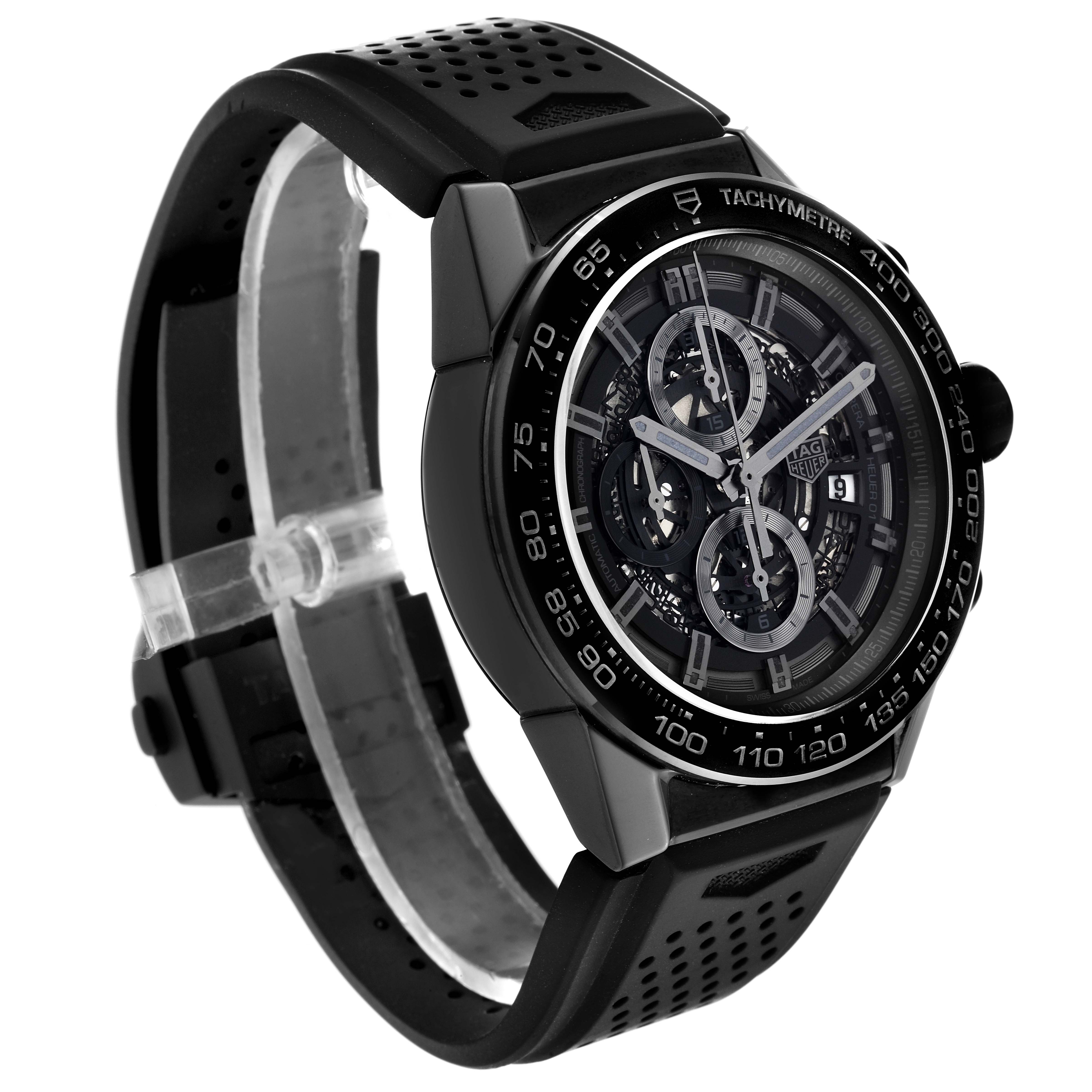 The Tag Heuer Carrera CAR2A90.FT6071 Men's Ceramic Transparent Dial CAR2A90.FT6071 Men's Ceramic Transparent Dial model watch is shown at an angle highlighting its face, crown, dial, and black perforated strap.