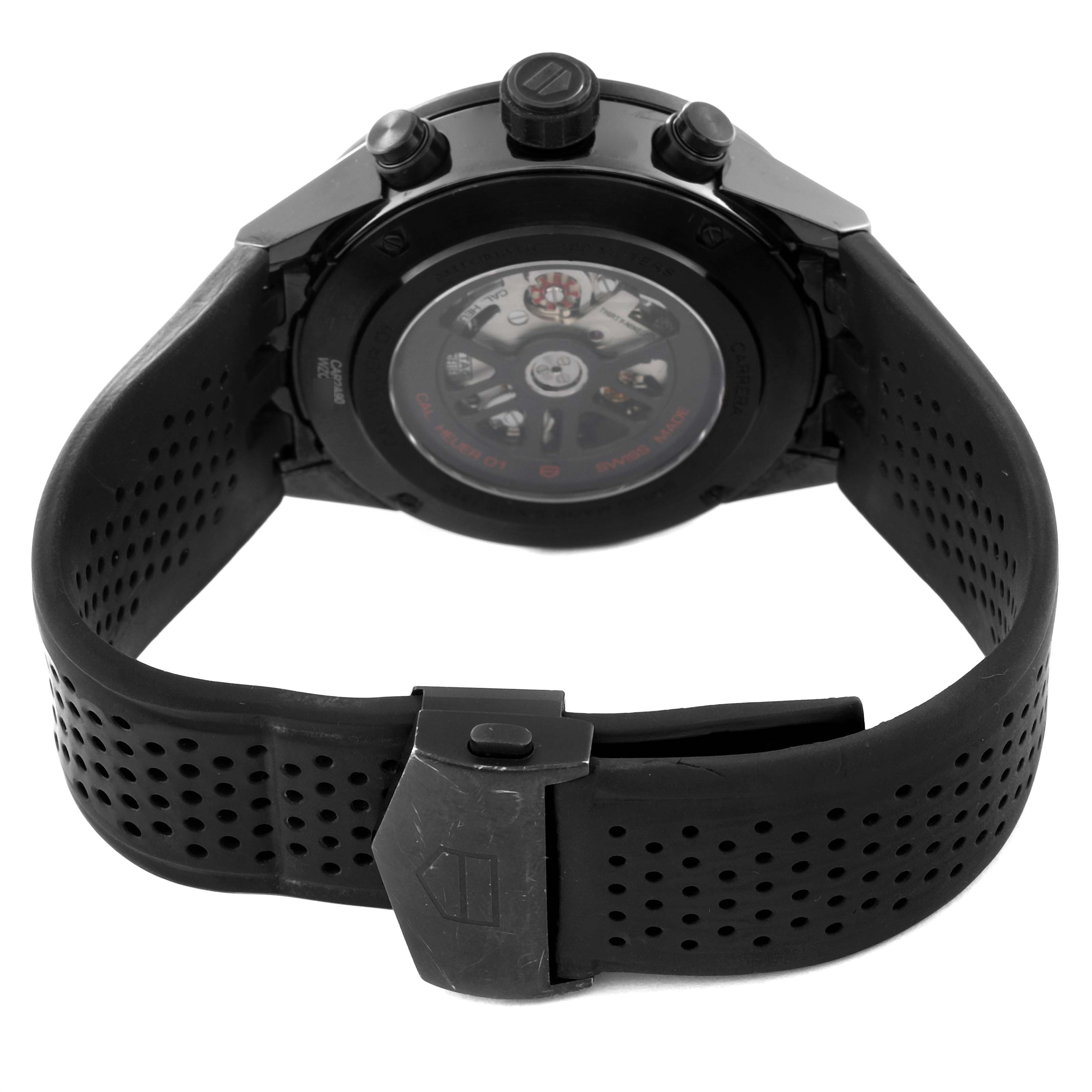 The image shows the back view of a Tag Heuer Carrera CAR2A90.FT6071 Men's Ceramic Black Dial CAR2A90.FT6071 Men's Ceramic Black Dial watch, highlighting its black rubber strap and case back.