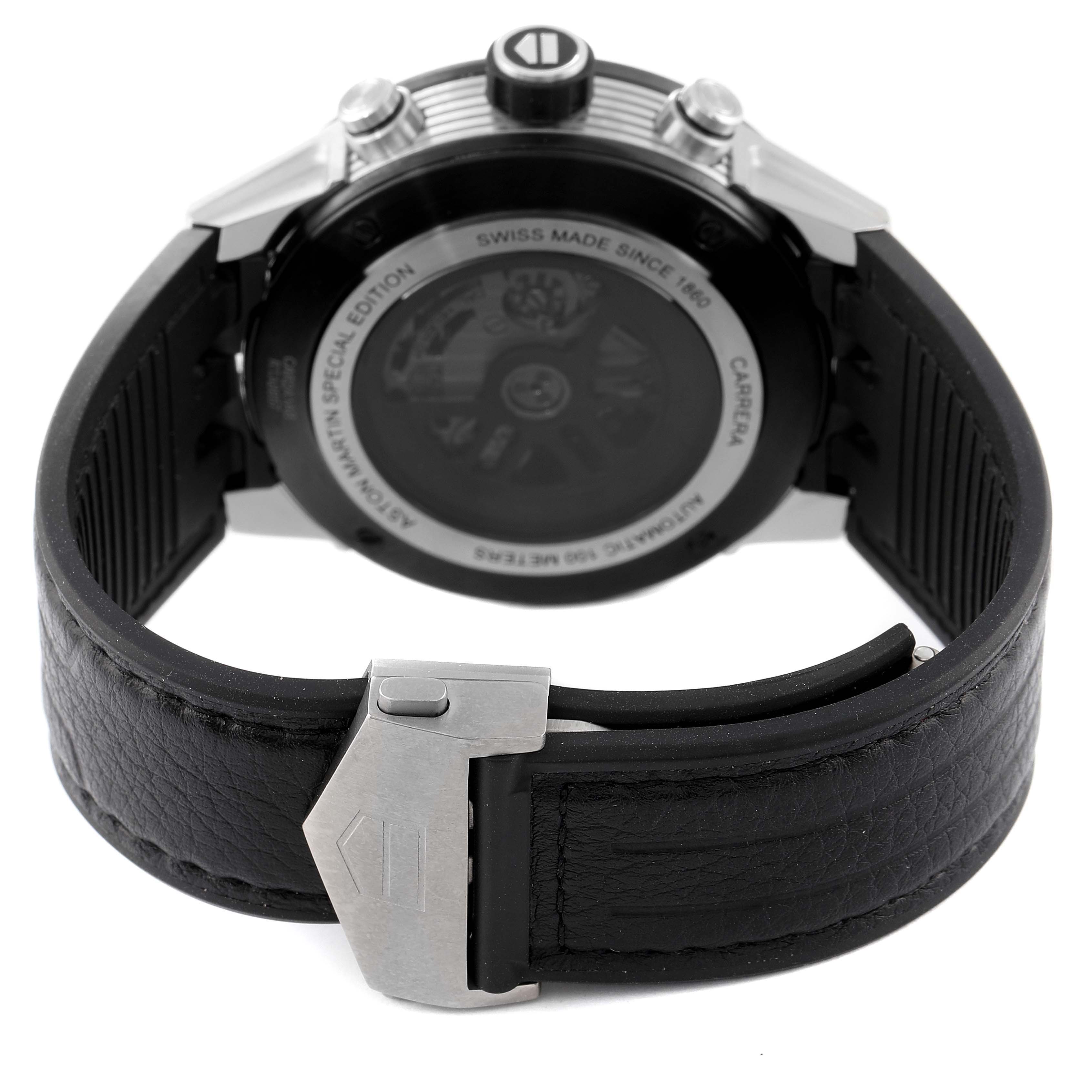 The image shows the back and clasp of a Tag Heuer Carrera CAR2A1AB.FT6163 Men's Stainless Steel Black Dial CAR2A1AB.FT6163 Men's Stainless Steel Black Dial watch, highlighting its black leather strap and metal clasp.