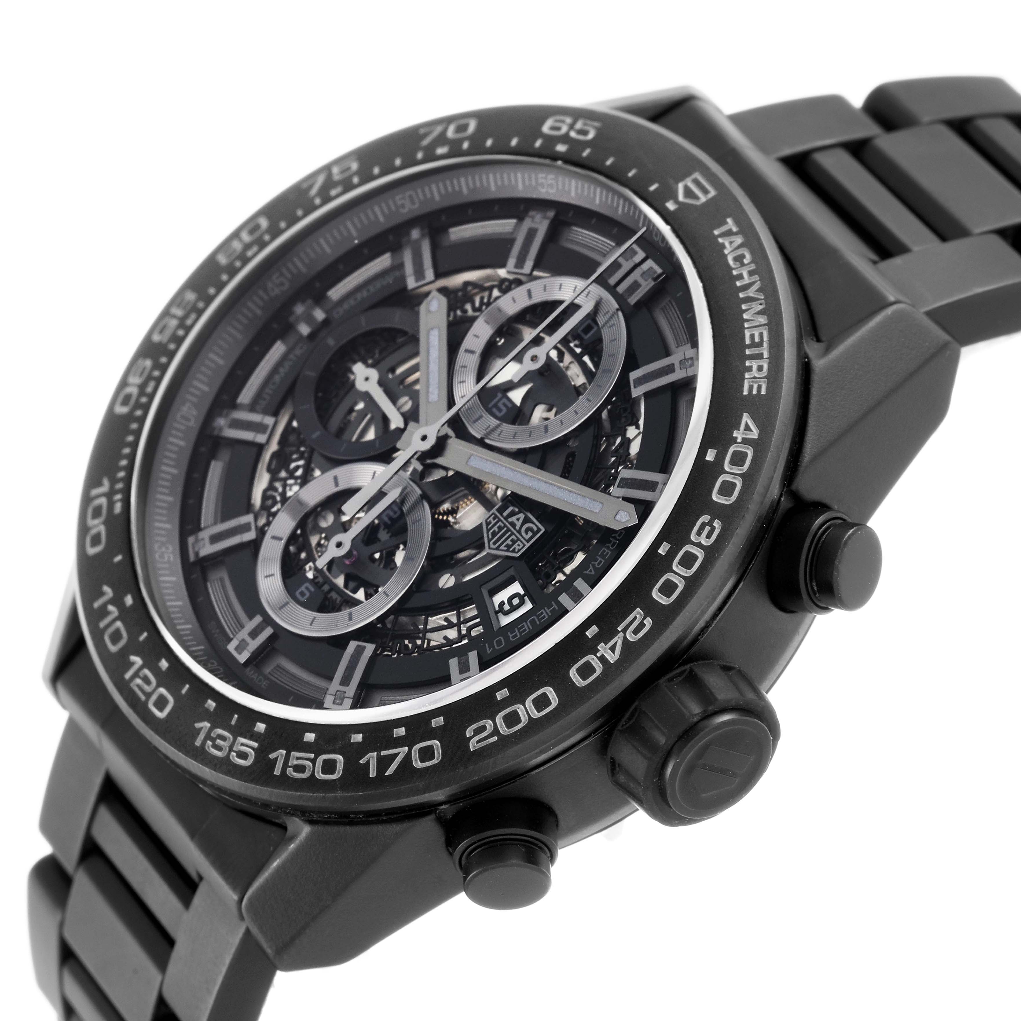 The image shows a Carrera model by Tag Heuer at an angle highlighting the dial, tachymeter bezel, and side pushers.