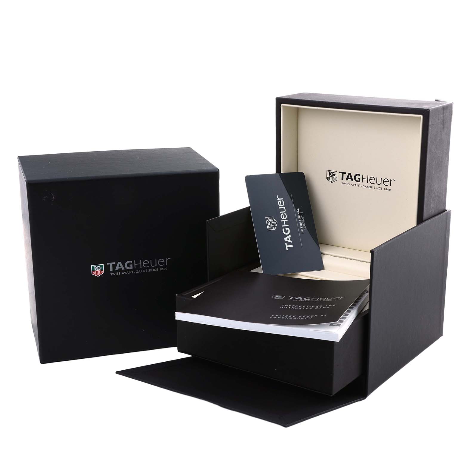 The image shows the packaging and documents for a Tag Heuer Carrera CAR2A91.BH0742 Men's Ceramic Black Dial, including a box, manual, and warranty card.