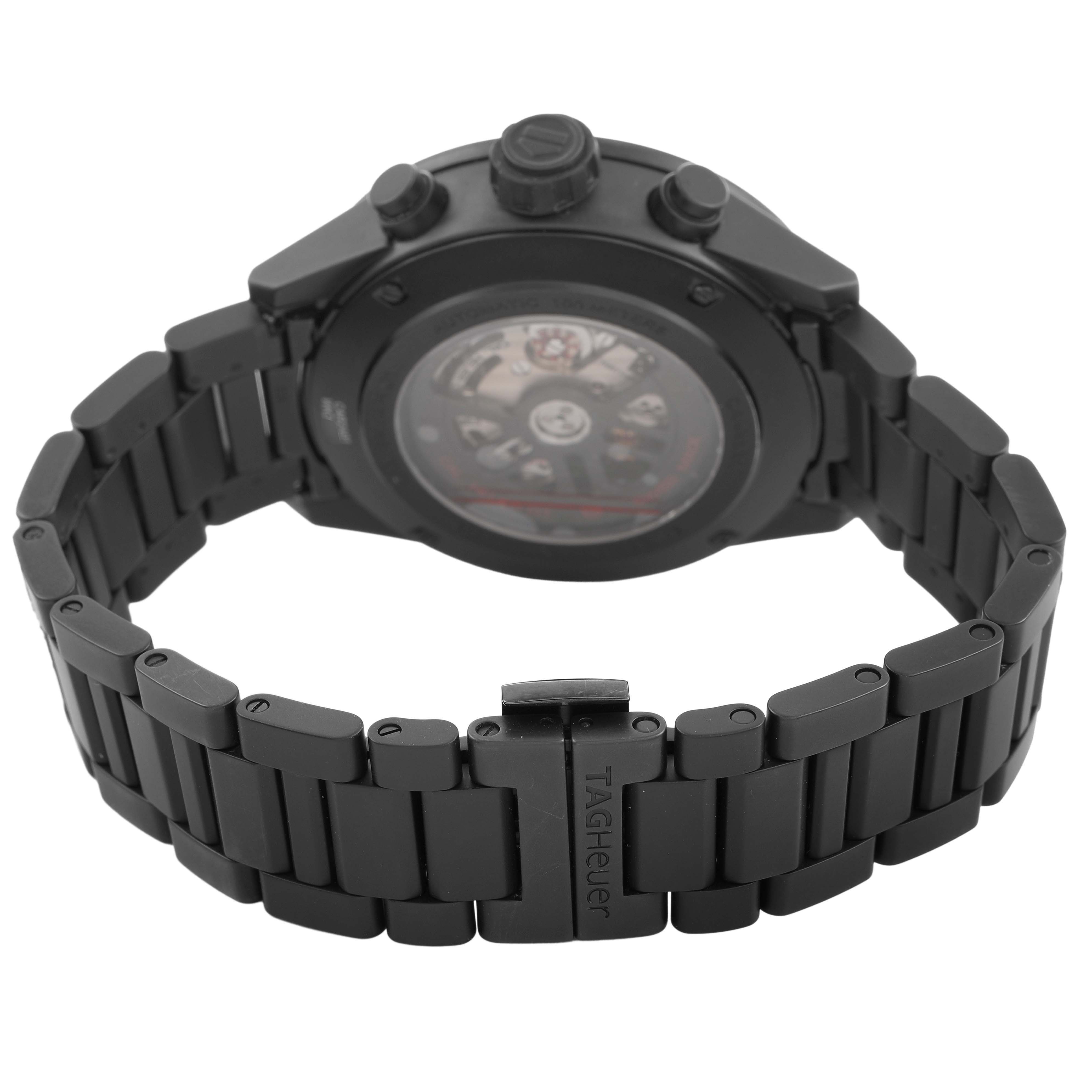 This image shows the back of the Carrera model by Tag Heuer, highlighting the movement through the case back and the bracelet with clasp.