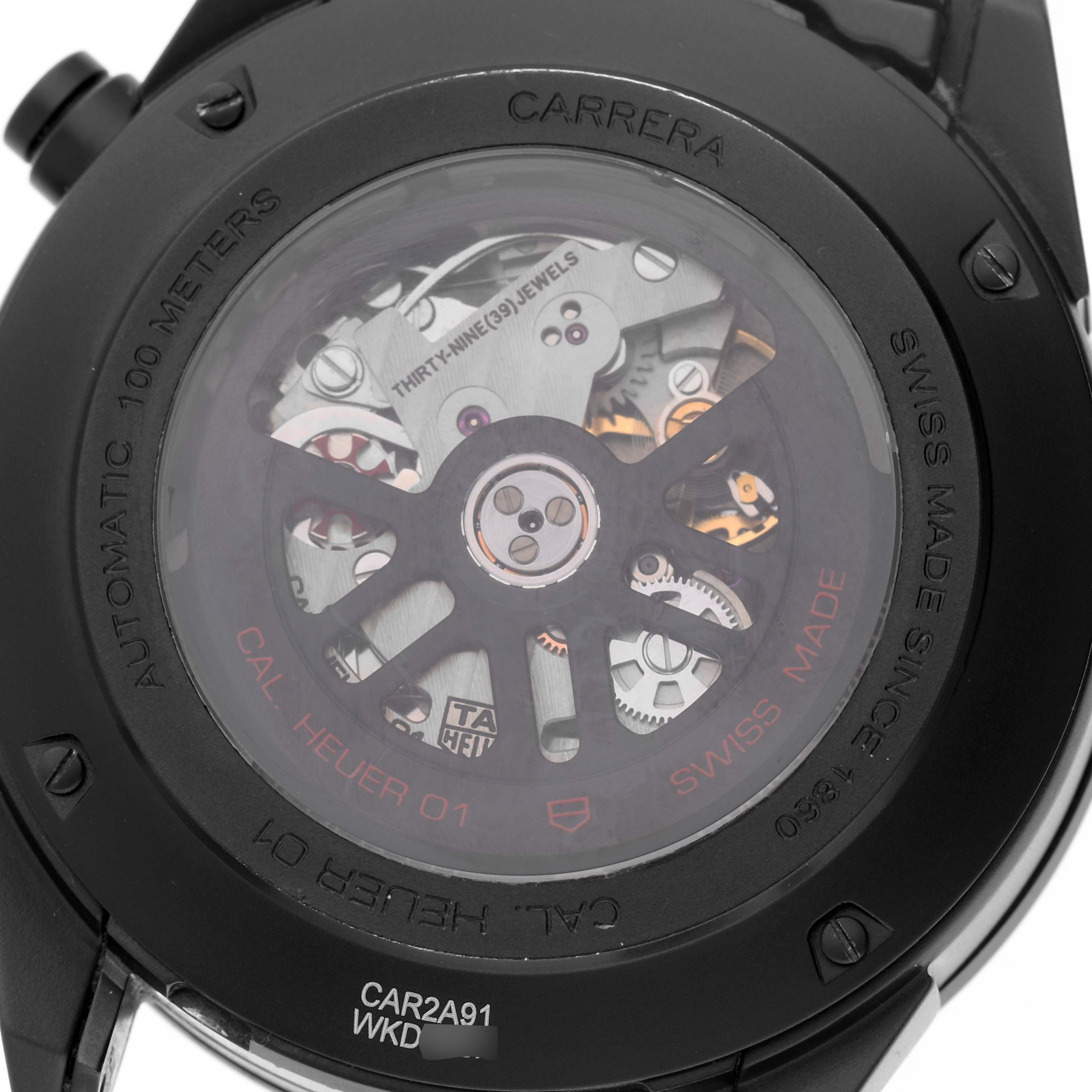 The image shows the back view of the Tag Heuer Carrera CAR2A91.BH0742 Men's Ceramic Black Dial watch, highlighting its automatic movement and case details.
