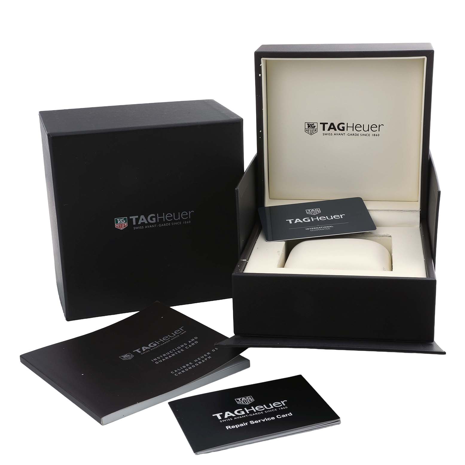 The image shows the Tag Heuer Carrera CAR2A91.BH0742 Men's Ceramic Black Dial watch box, warranty card, and manuals from a frontal angle.
