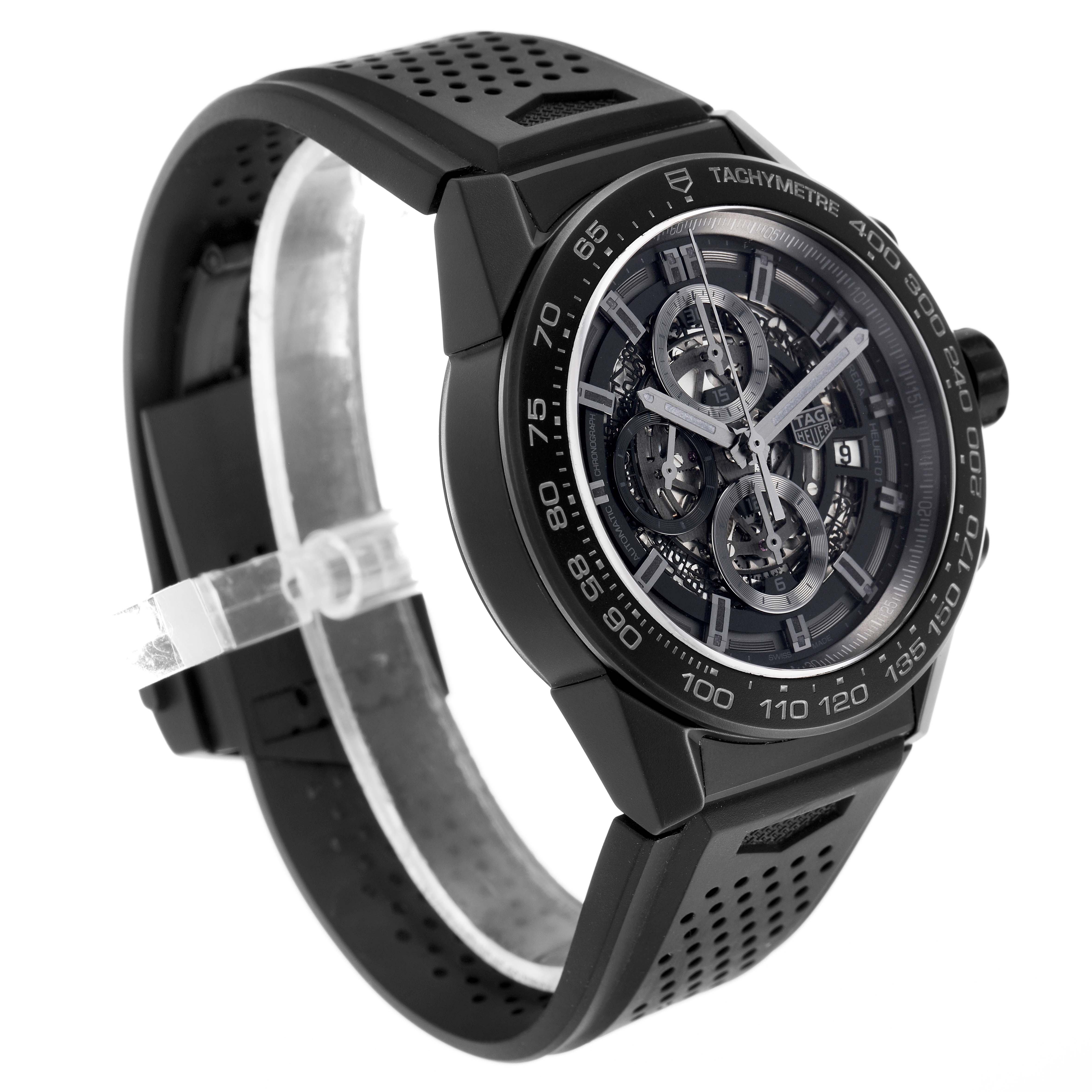 The Tag Heuer Carrera CAR2A91.BH0742 Men's Ceramic Black Dial watch is shown at a three-quarter angle, highlighting the dial, bezel, and perforated rubber strap.