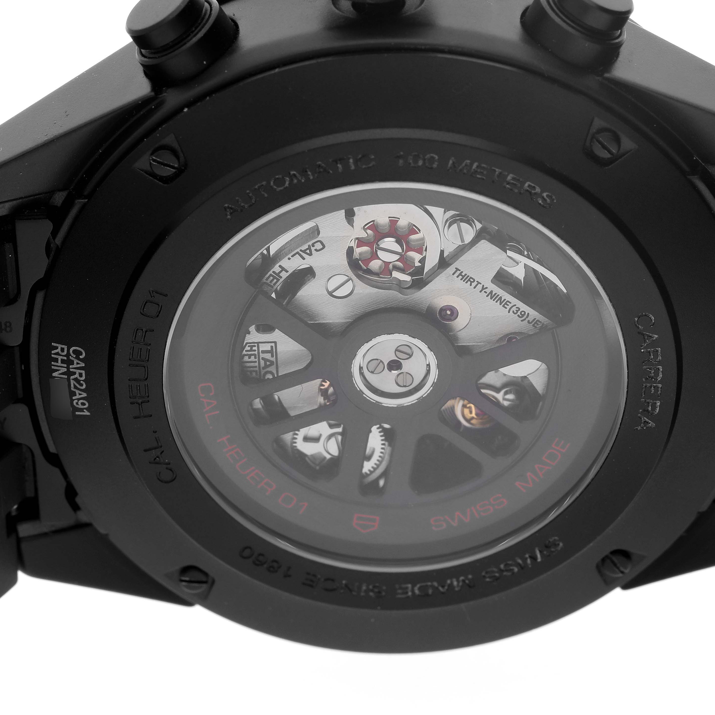 The image shows the back view of the Tag Heuer Carrera CAR2A91.BH0742 Men's Ceramic Black Dial model, highlighting its automatic movement and intricate mechanism.