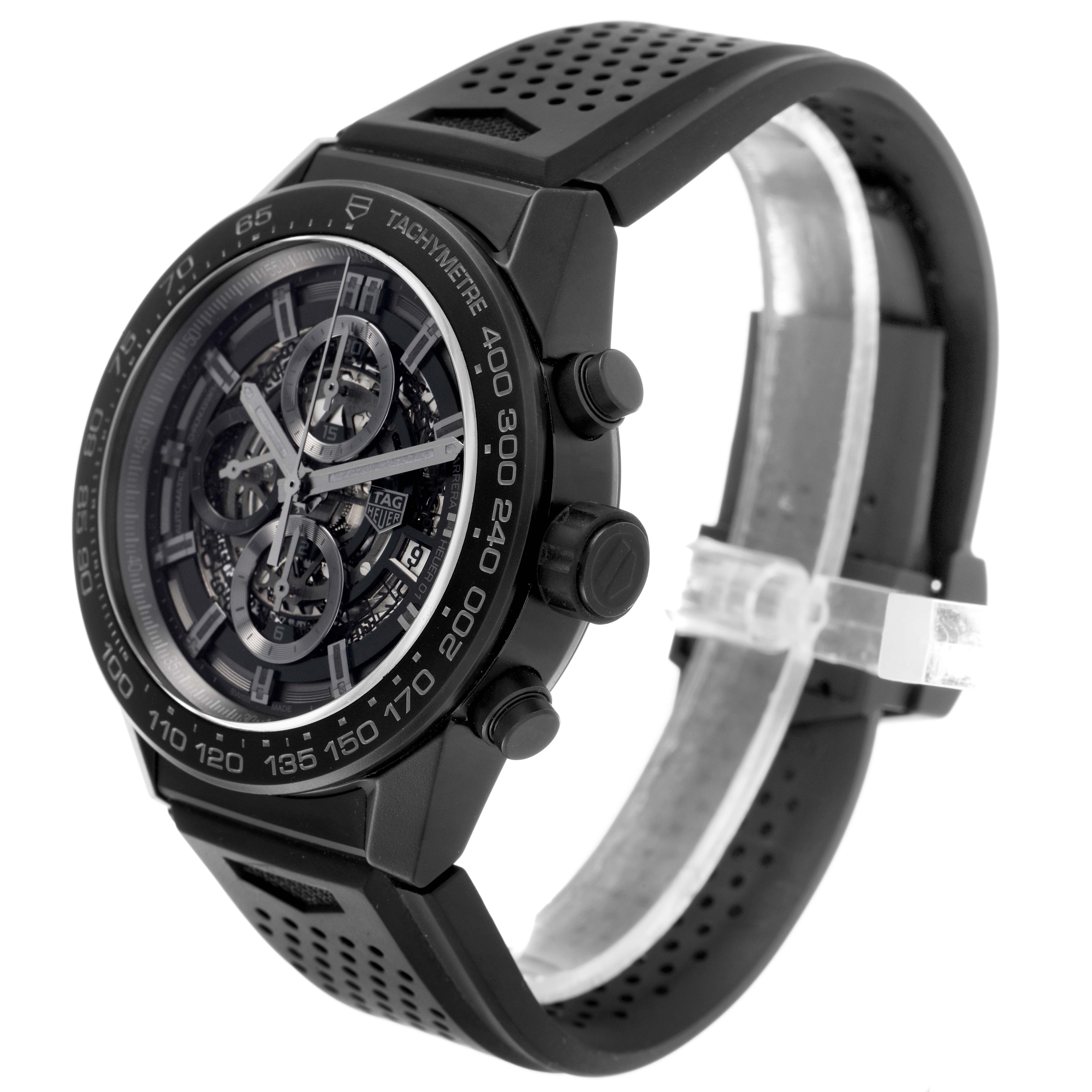 The image shows a Tag Heuer Carrera CAR2A91.BH0742 Men's Ceramic Black Dial watch at a three-quarter angle, displaying the face, bezel, pushers, and perforated strap.