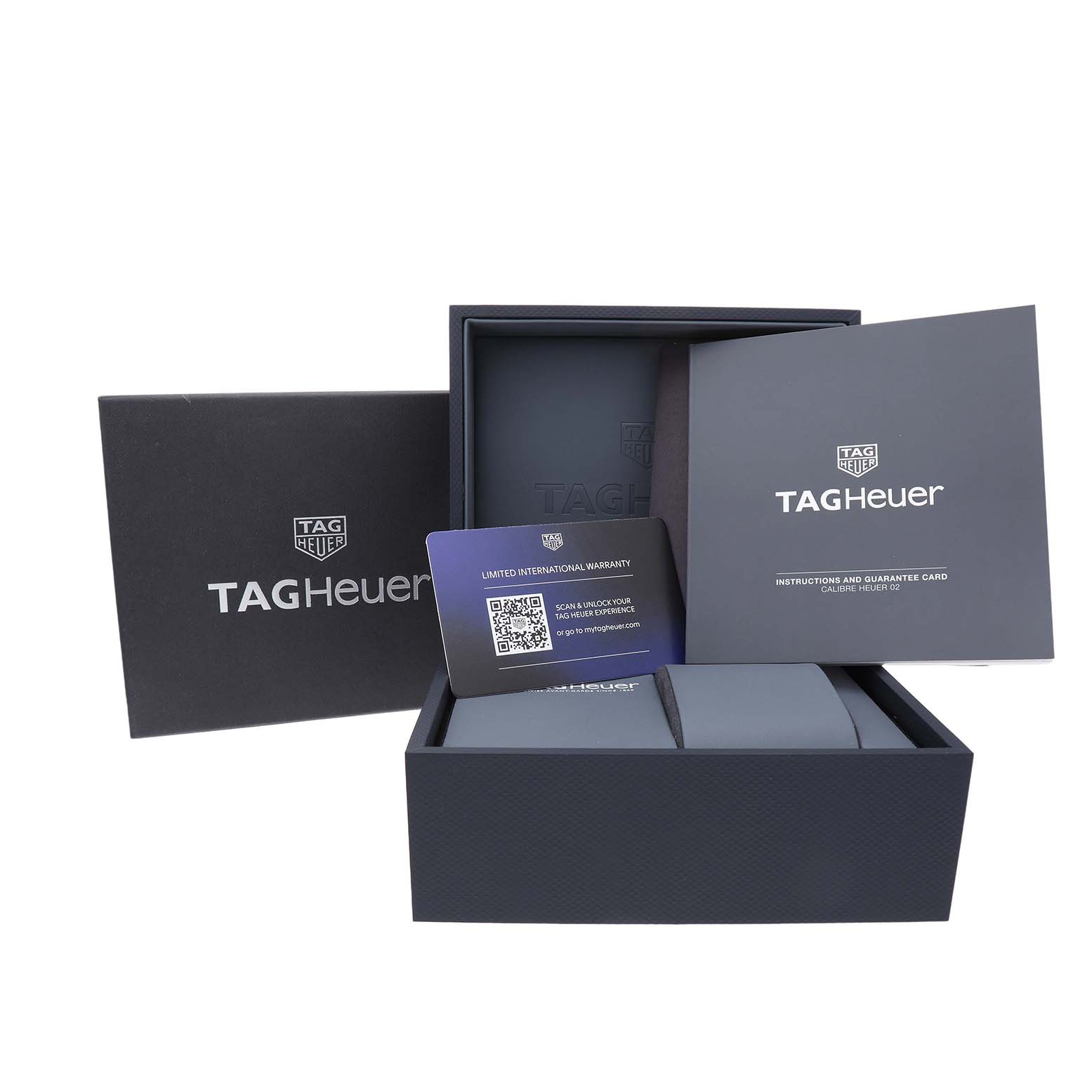 The image shows a Tag Heuer Carrera CBG2A90.BH0653 Men's Ceramic Black Dial watch box, warranty card, and instruction booklet from a front angle.
